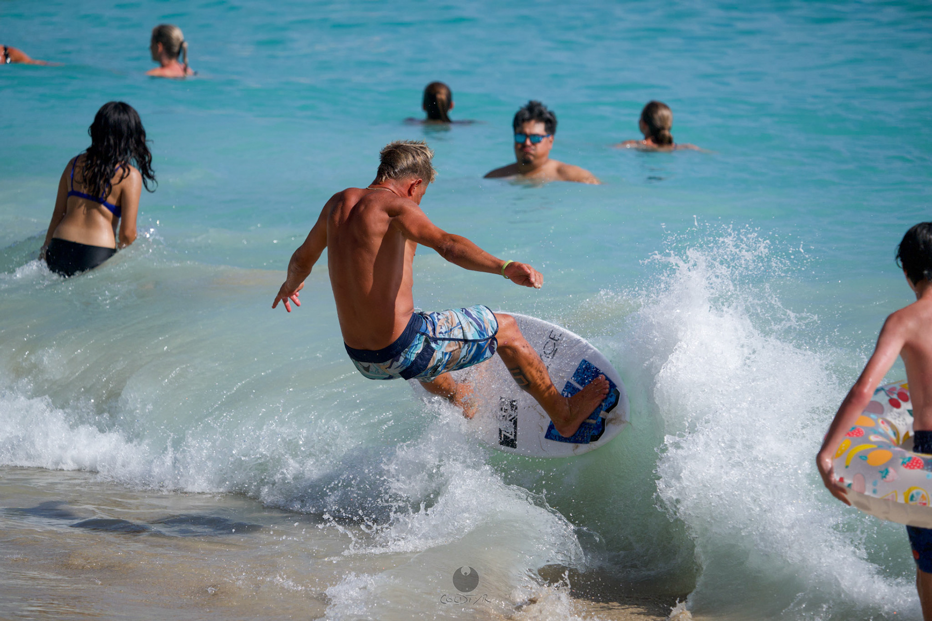 Brian "Hollywood" rips the Waikiki shore break.