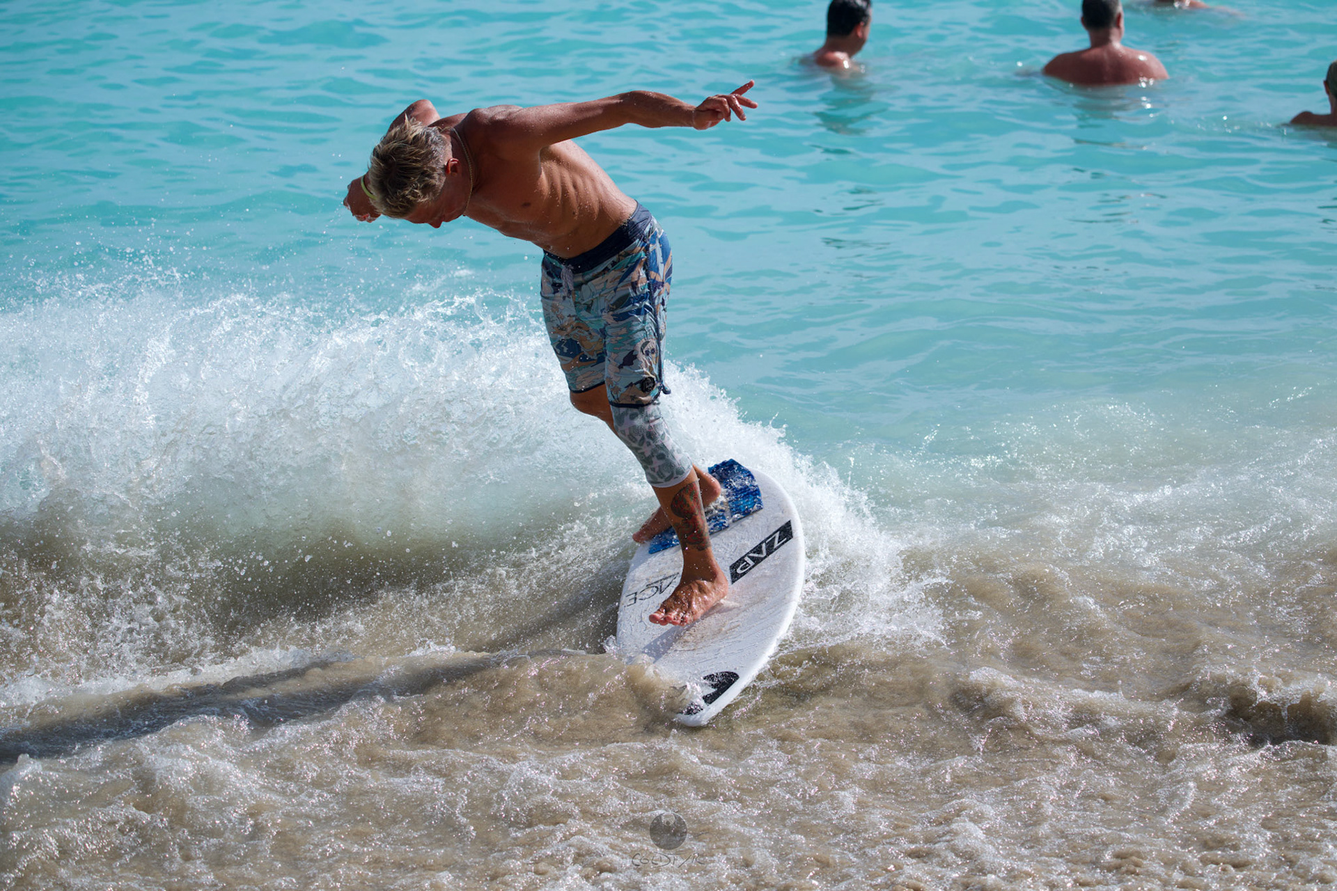 Brian "Hollywood" rips the Waikiki shore break.