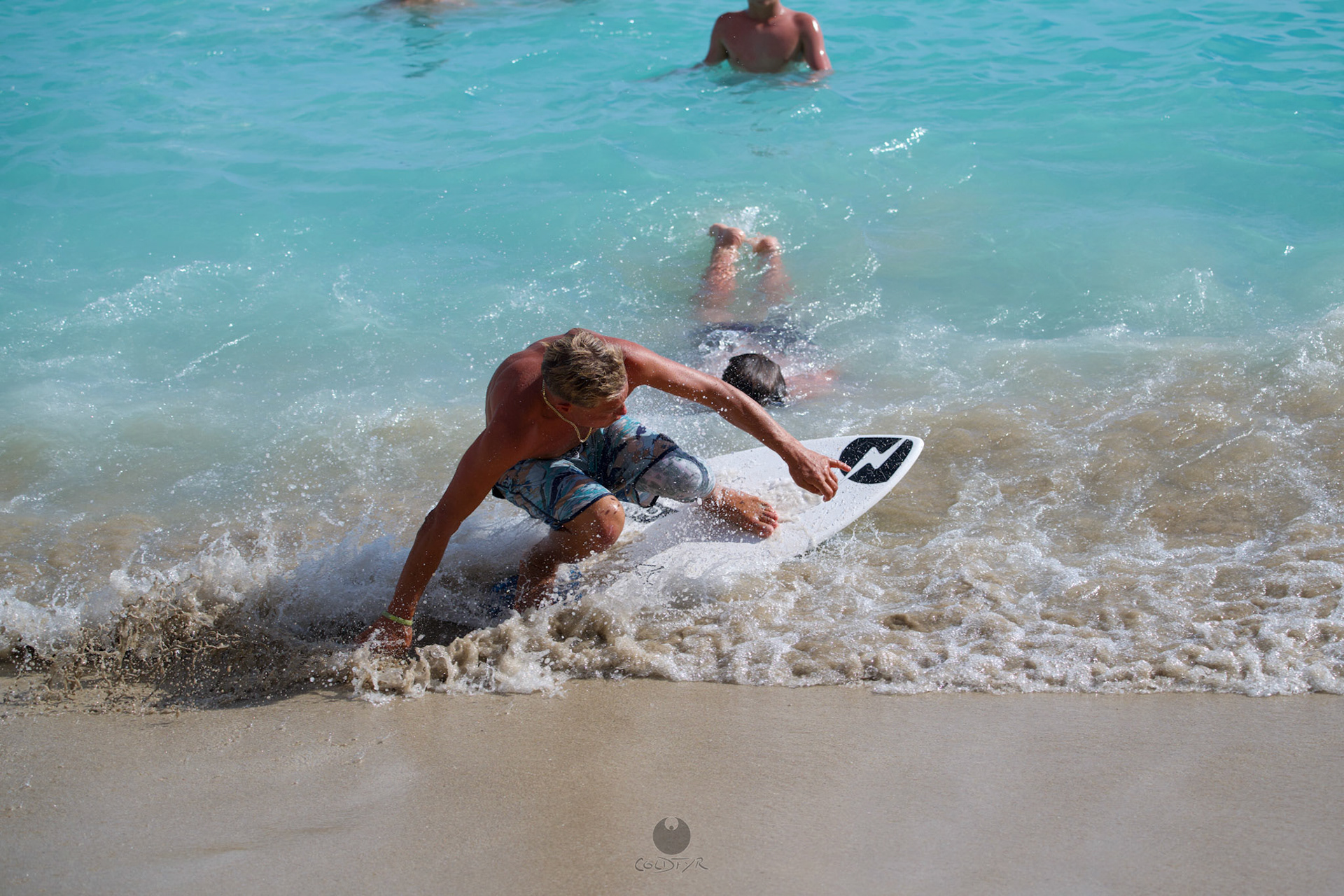 Brian "Hollywood" rips the Waikiki shore break.