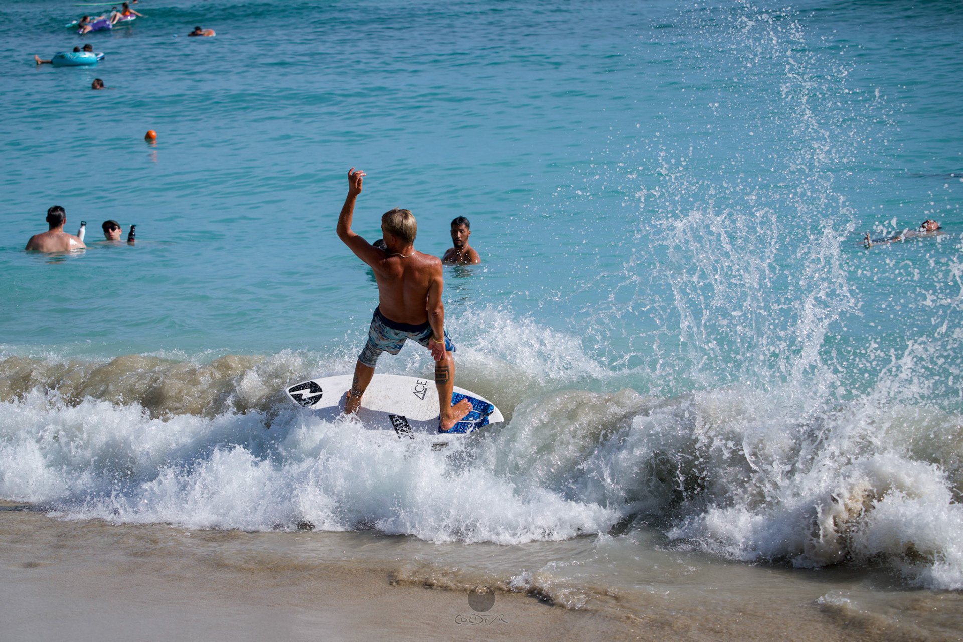 Brian "Hollywood" rips the Waikiki shore break.