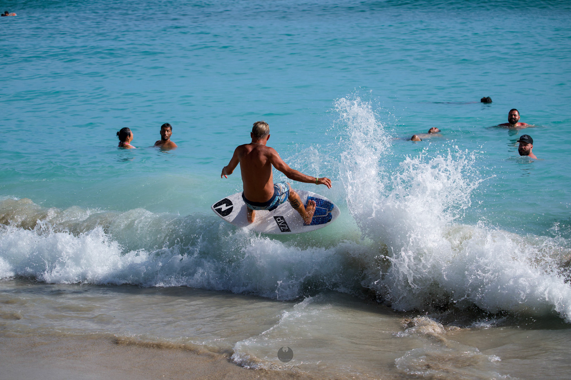 Brian "Hollywood" rips the Waikiki shore break.