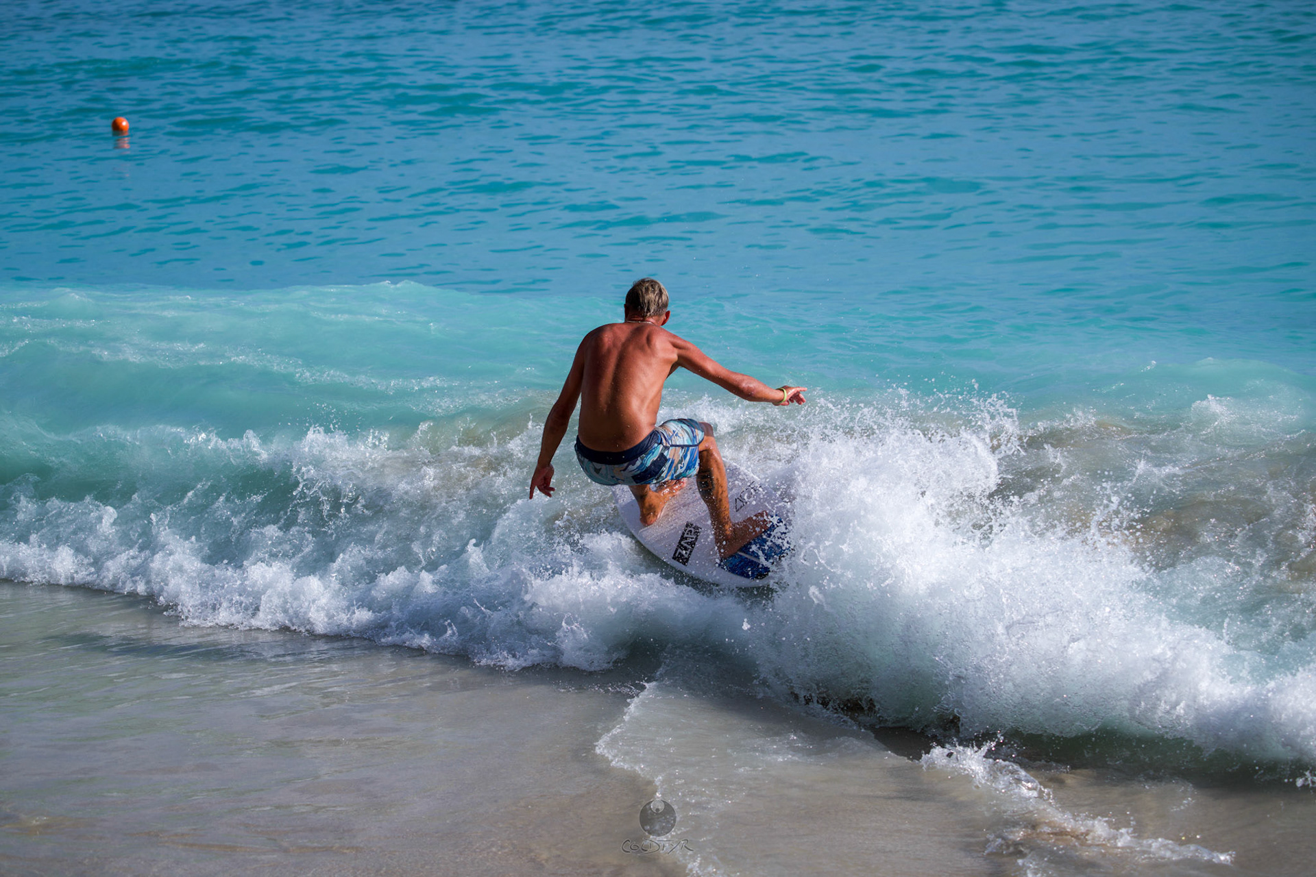 Brian "Hollywood" rips the Waikiki shore break.