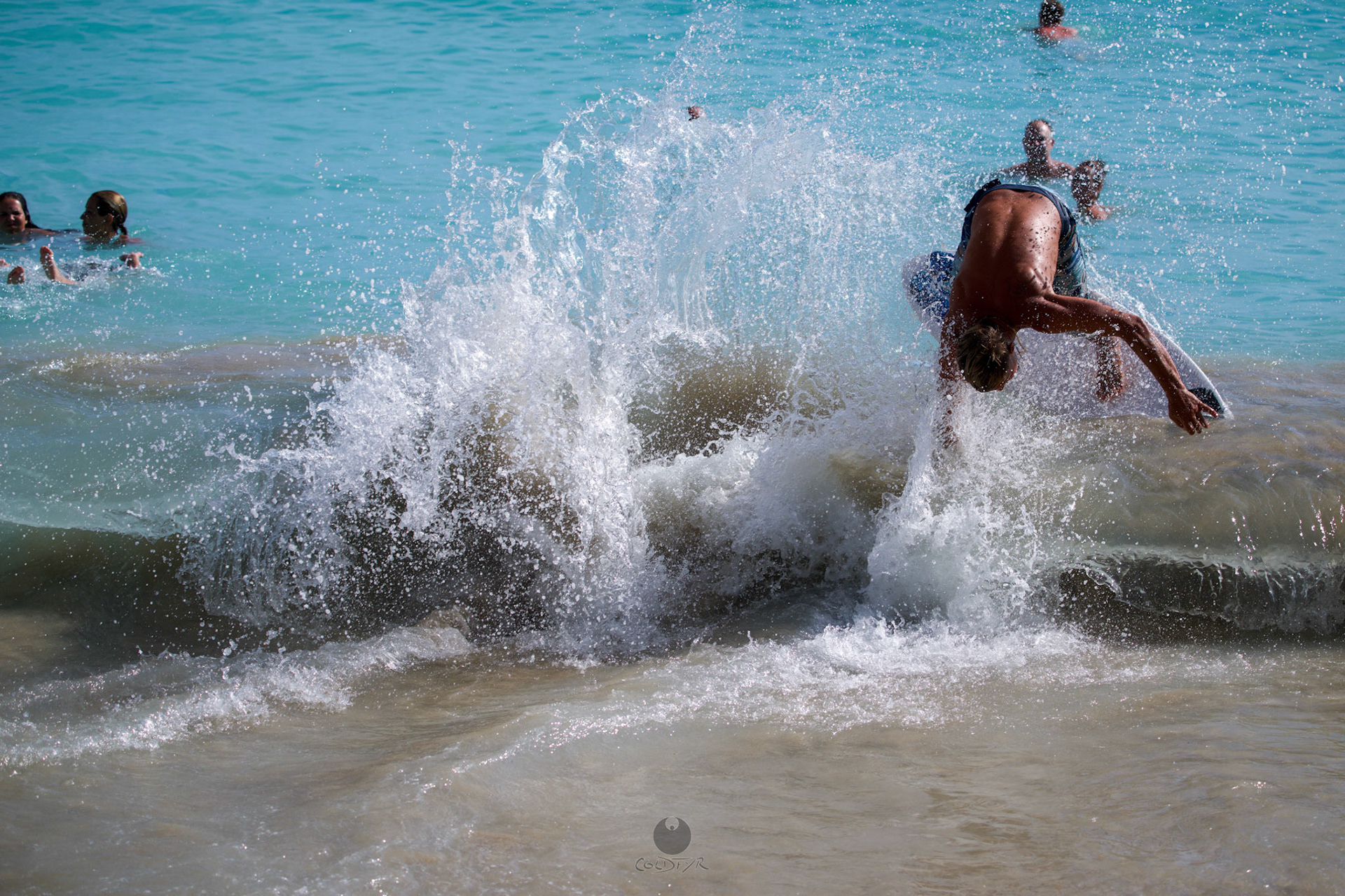 Brian "Hollywood" rips the Waikiki shore break.