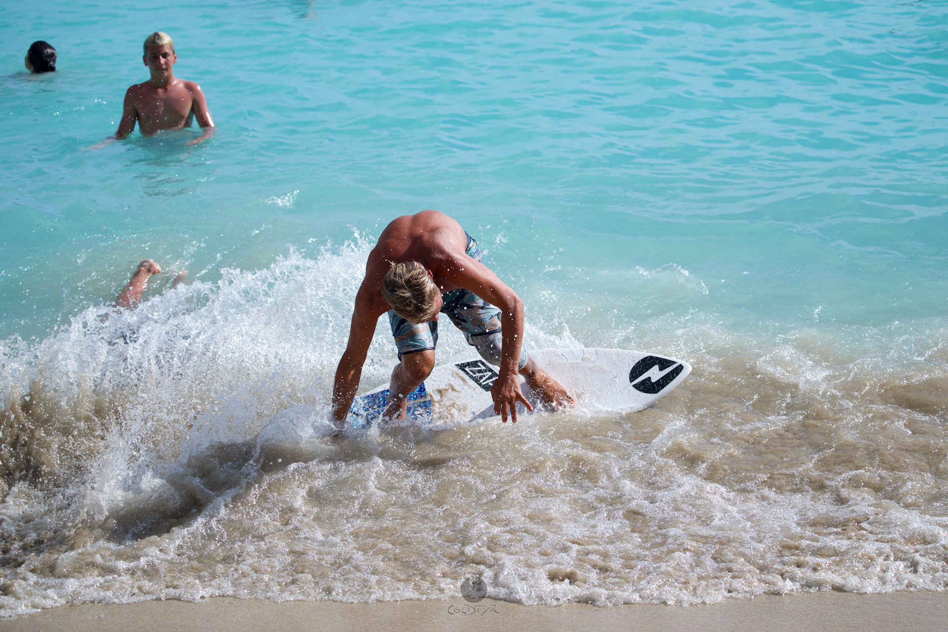 Brian "Hollywood" rips the Waikiki shore break.