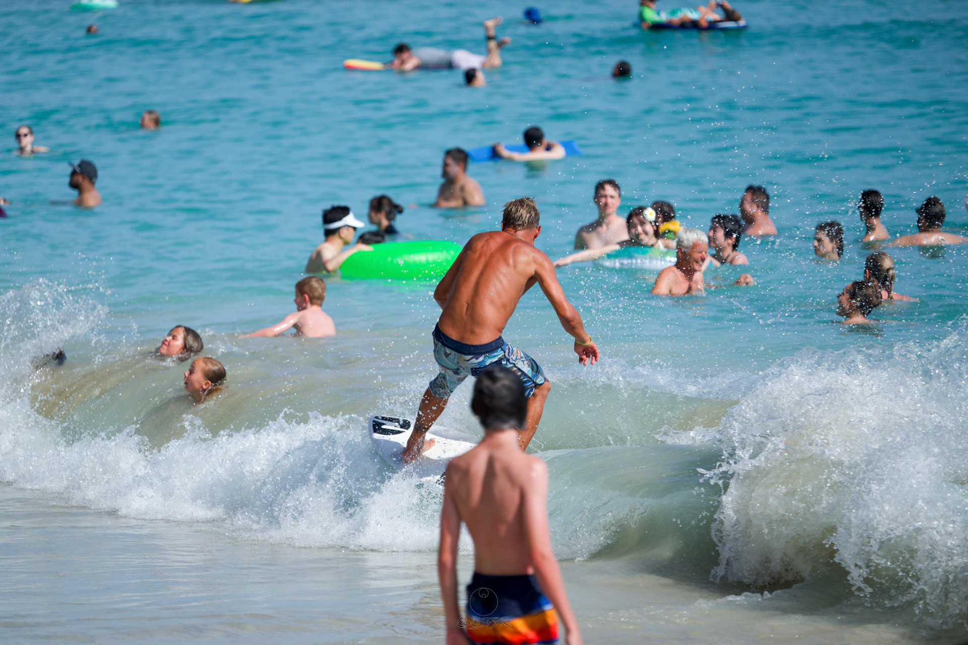 Brian "Hollywood" rips the Waikiki shore break.