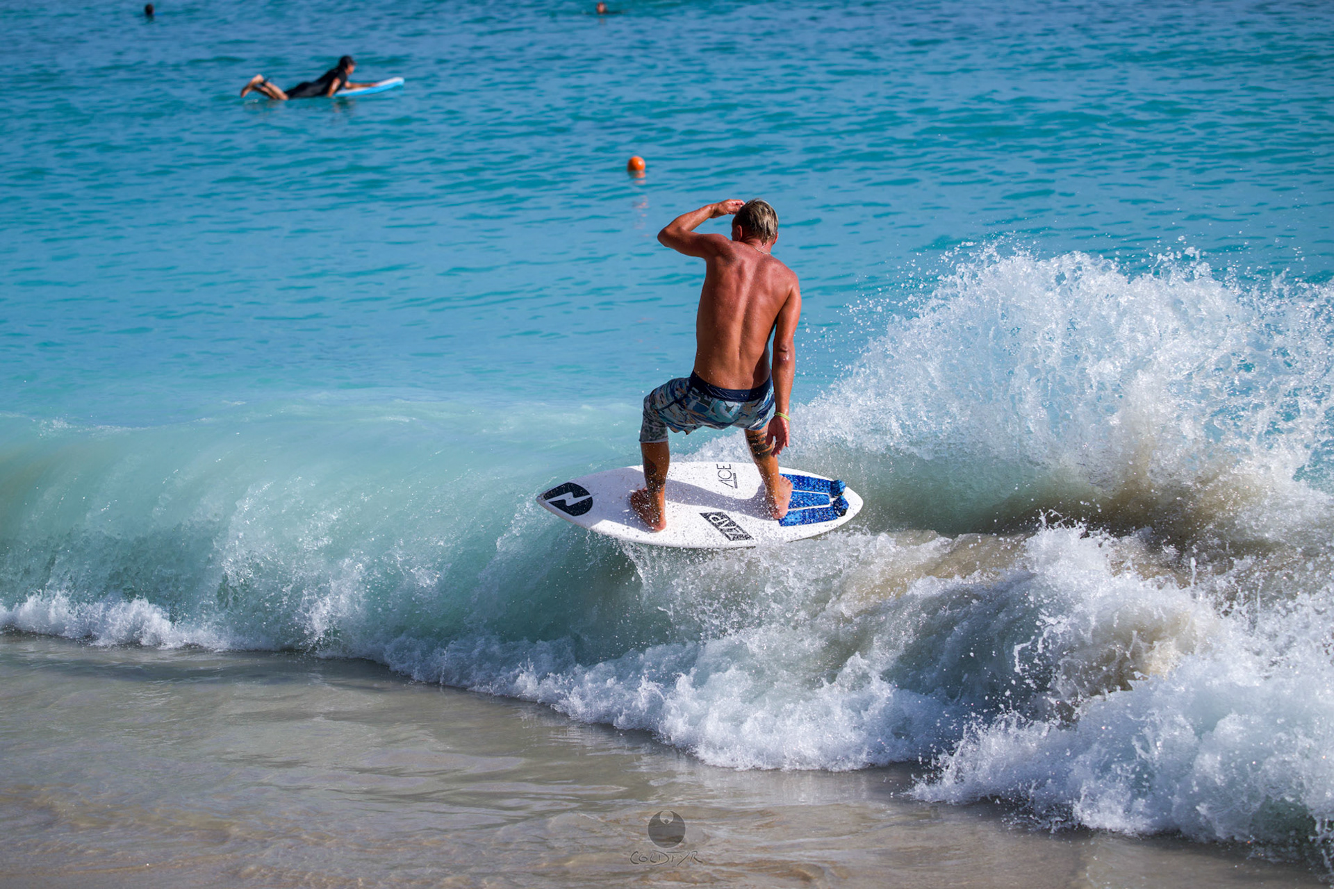 Brian "Hollywood" rips the Waikiki shore break.