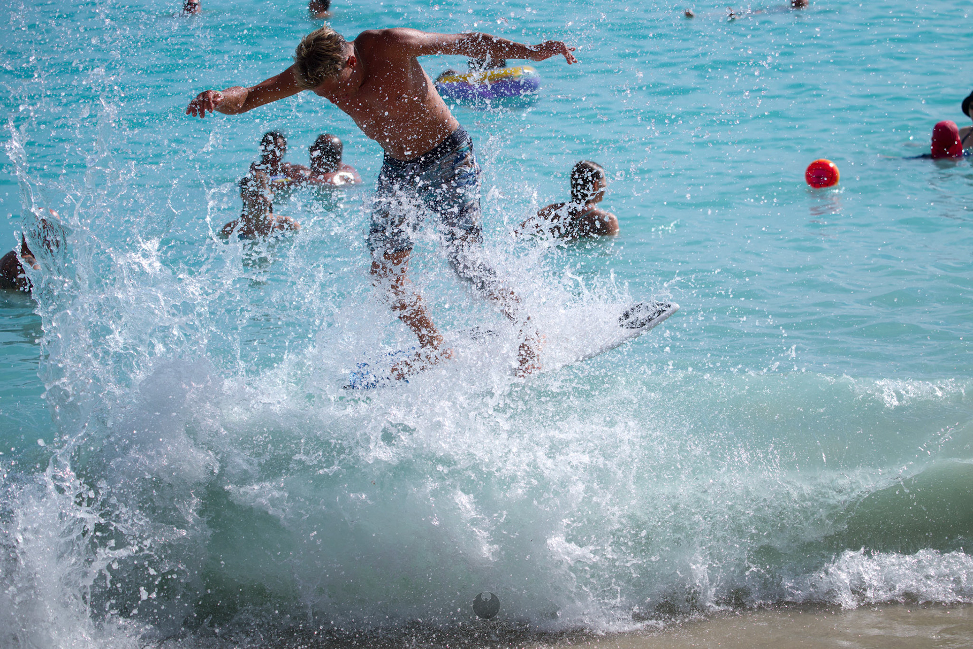 Brian "Hollywood" rips the Waikiki shore break.