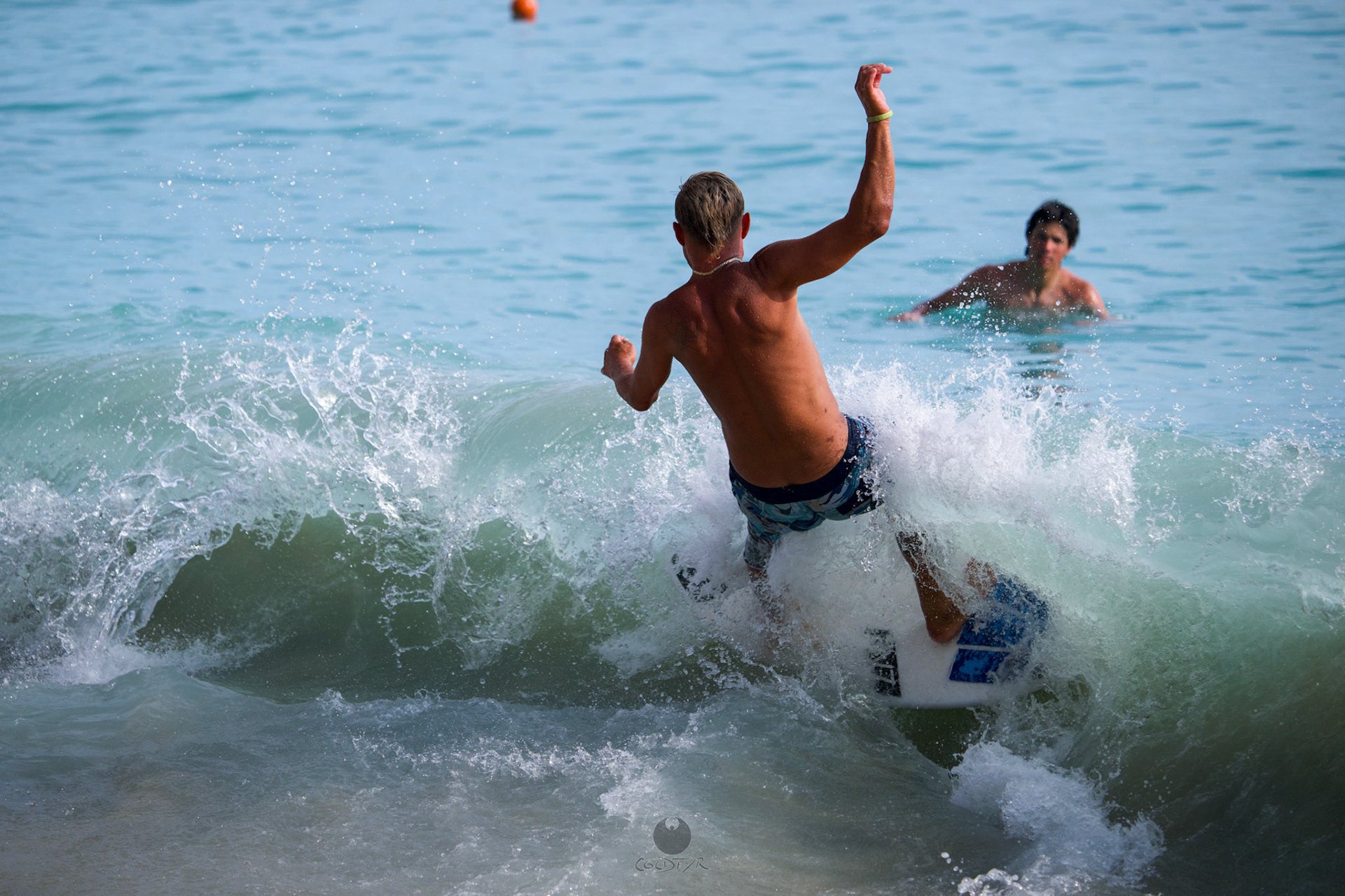 Brian "Hollywood" rips the Waikiki shore break.
