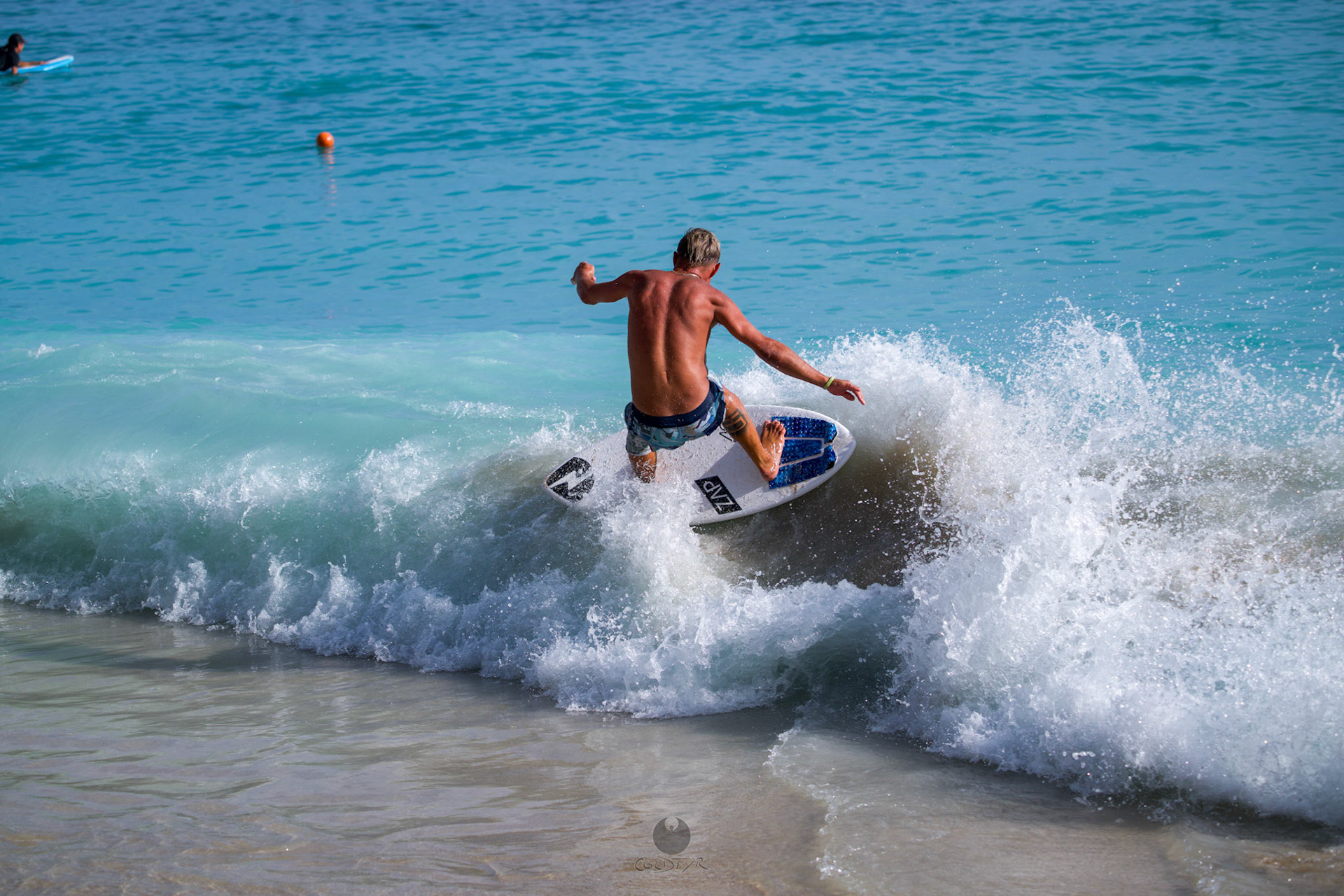 Brian "Hollywood" rips the Waikiki shore break.