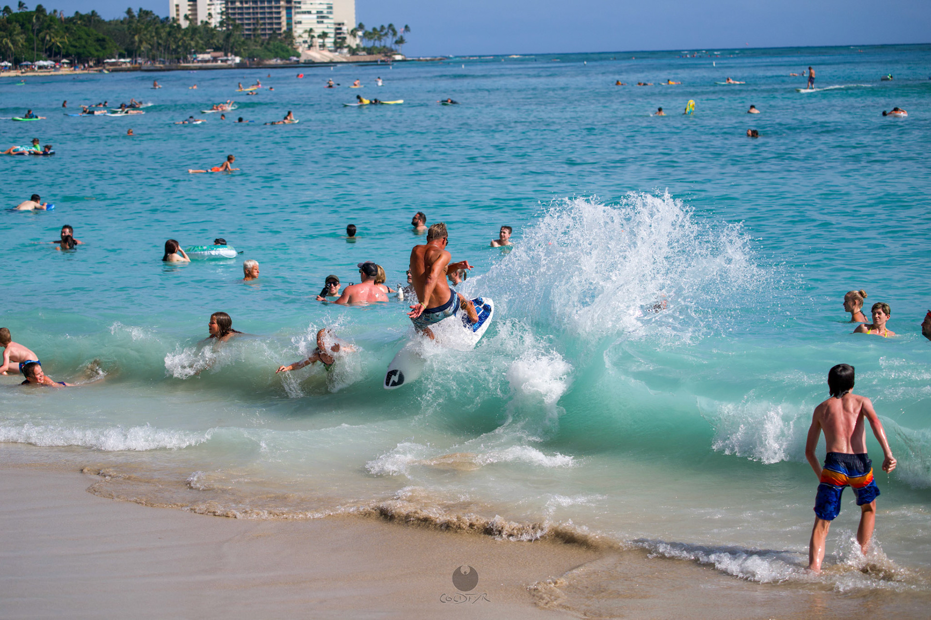 Brian "Hollywood" rips the Waikiki shore break.