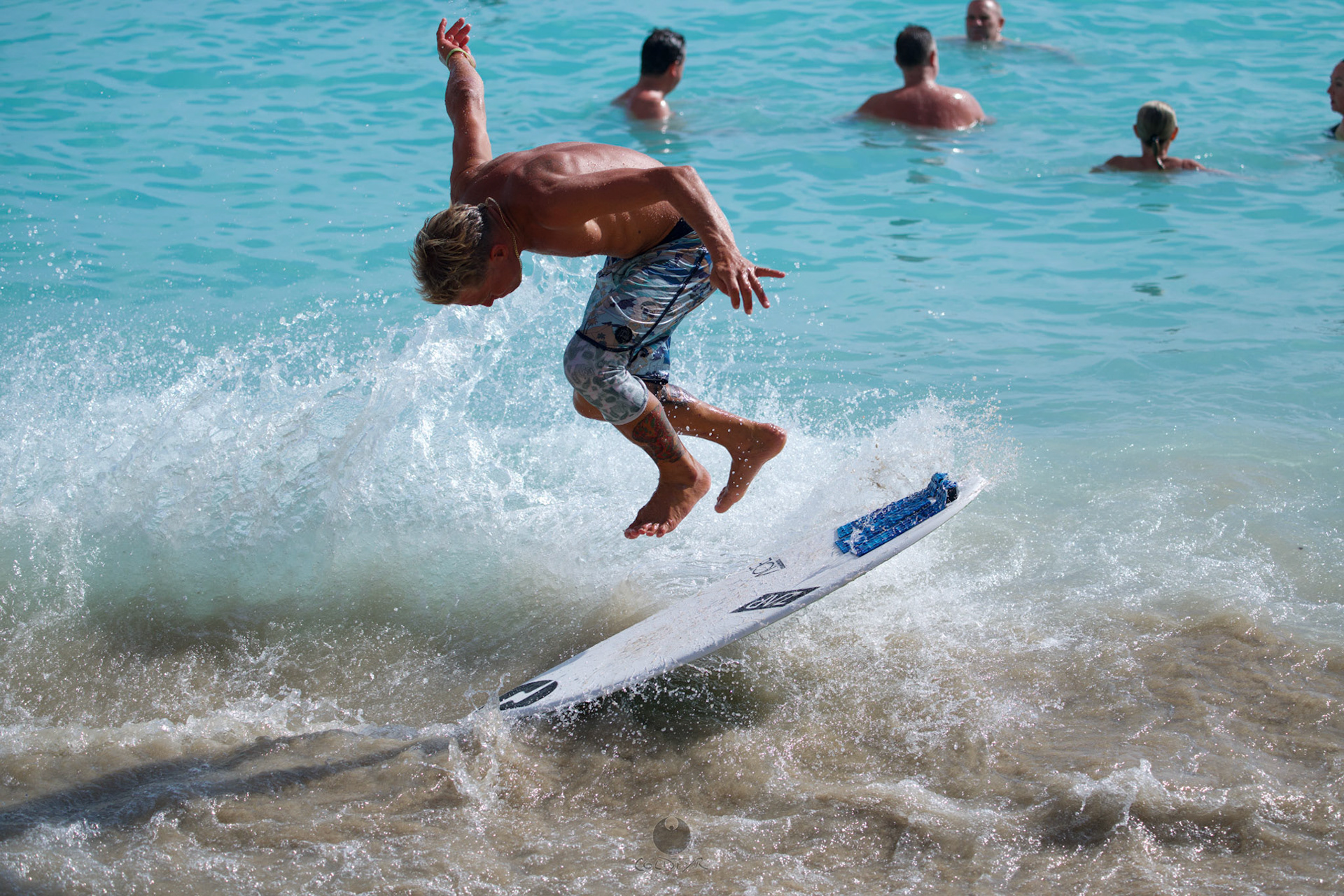 Brian "Hollywood" rips the Waikiki shore break.