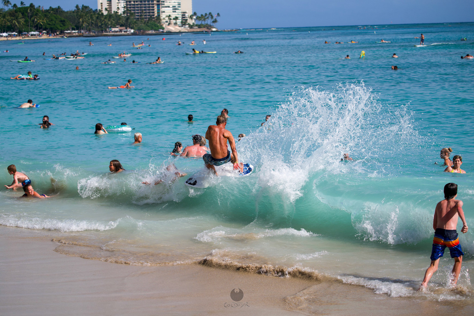 Brian "Hollywood" rips the Waikiki shore break.