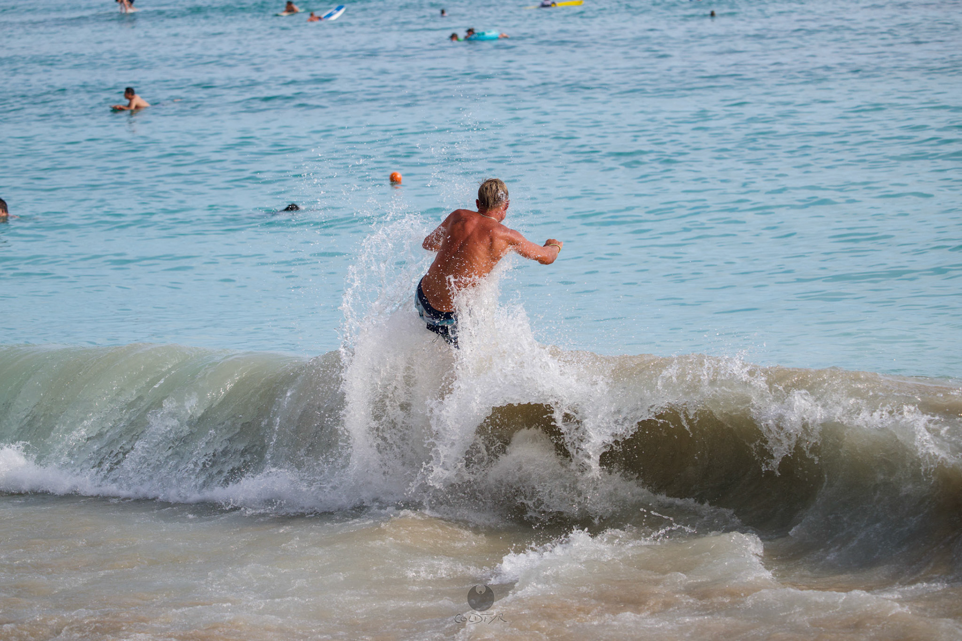 Brian "Hollywood" rips the Waikiki shore break.