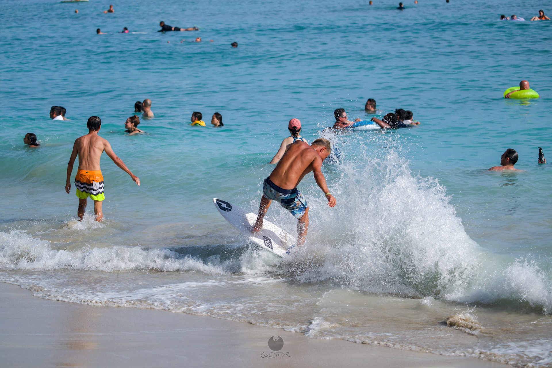 Brian "Hollywood" rips the Waikiki shore break.