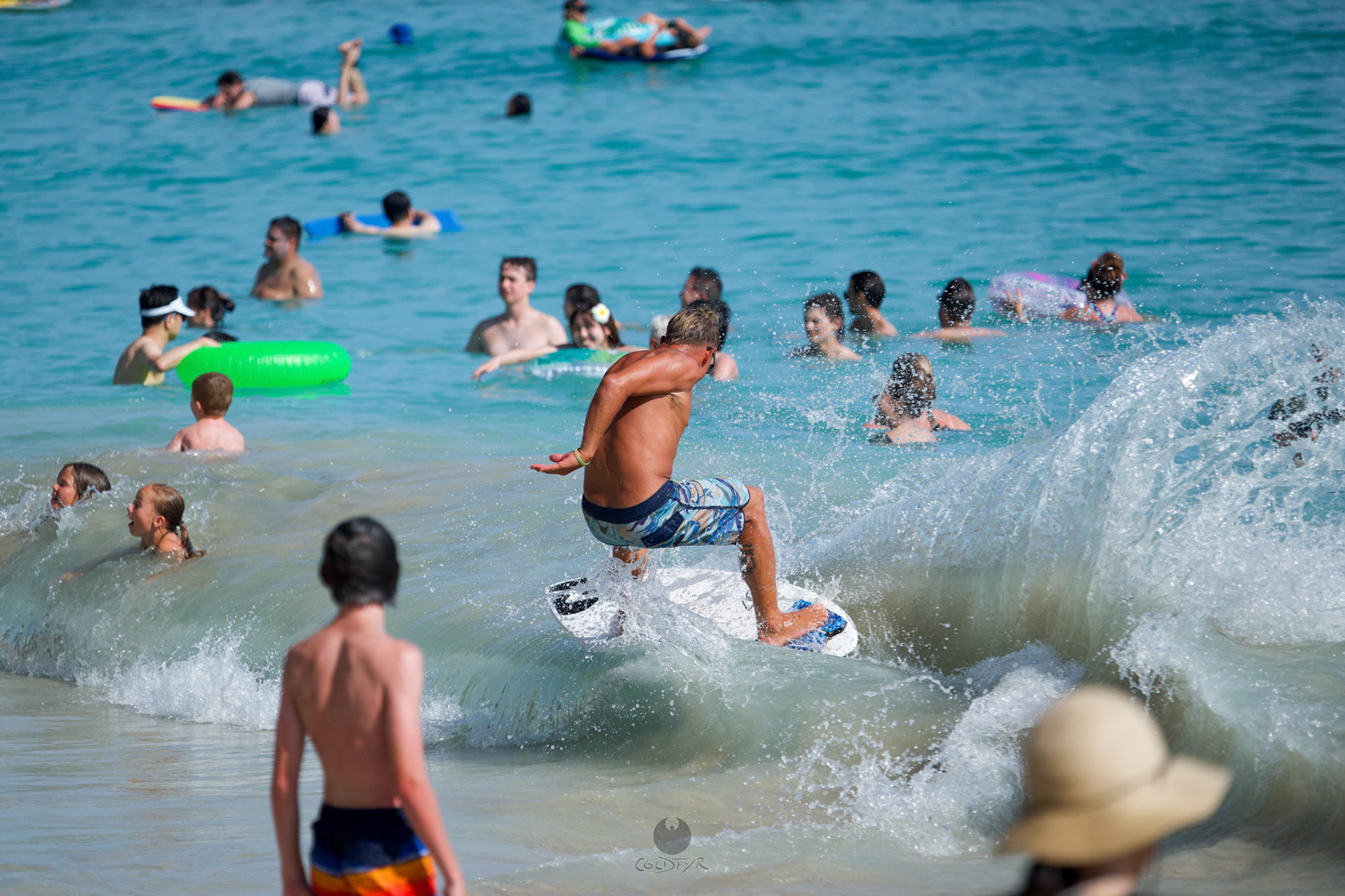 Brian "Hollywood" rips the Waikiki shore break.