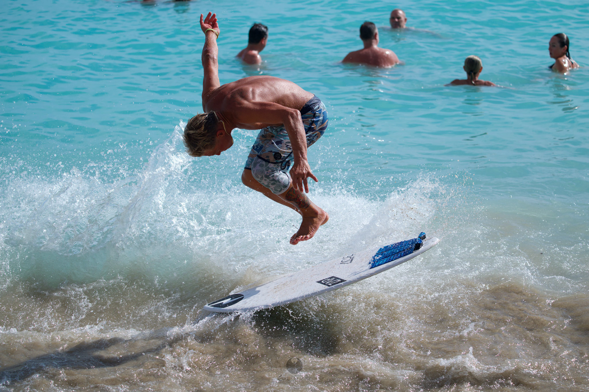 Brian "Hollywood" rips the Waikiki shore break.