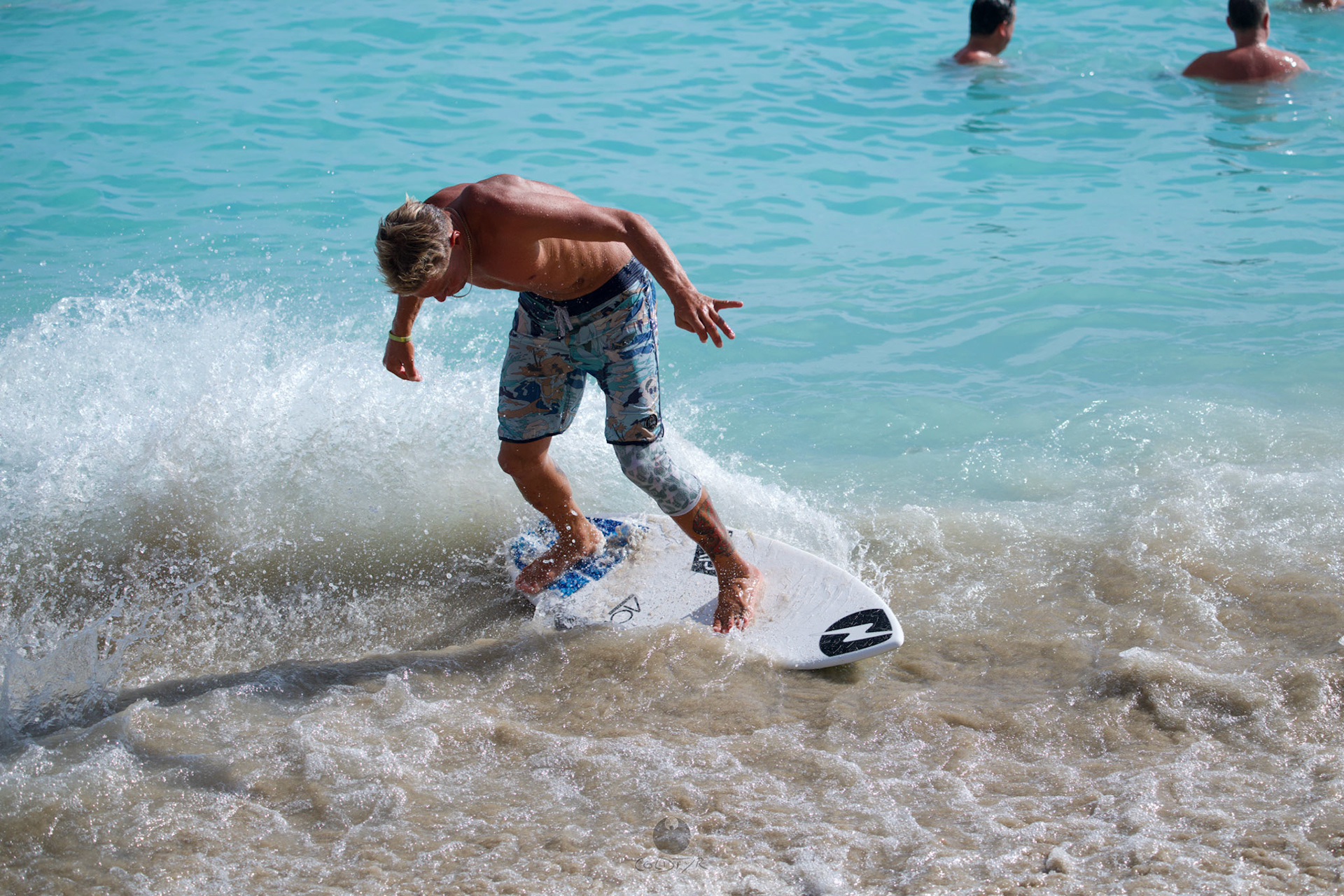 Brian "Hollywood" rips the Waikiki shore break.