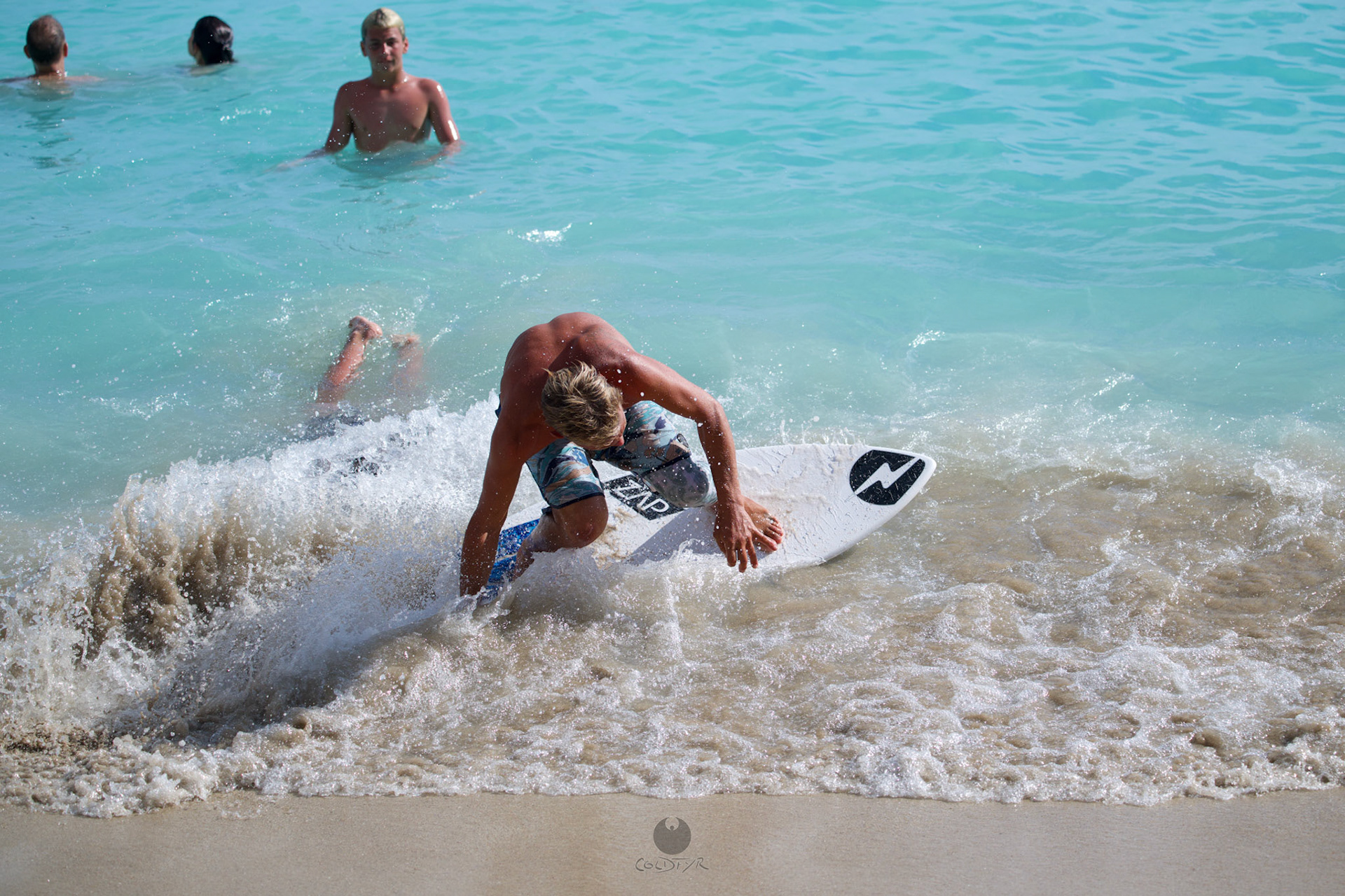 Brian "Hollywood" rips the Waikiki shore break.