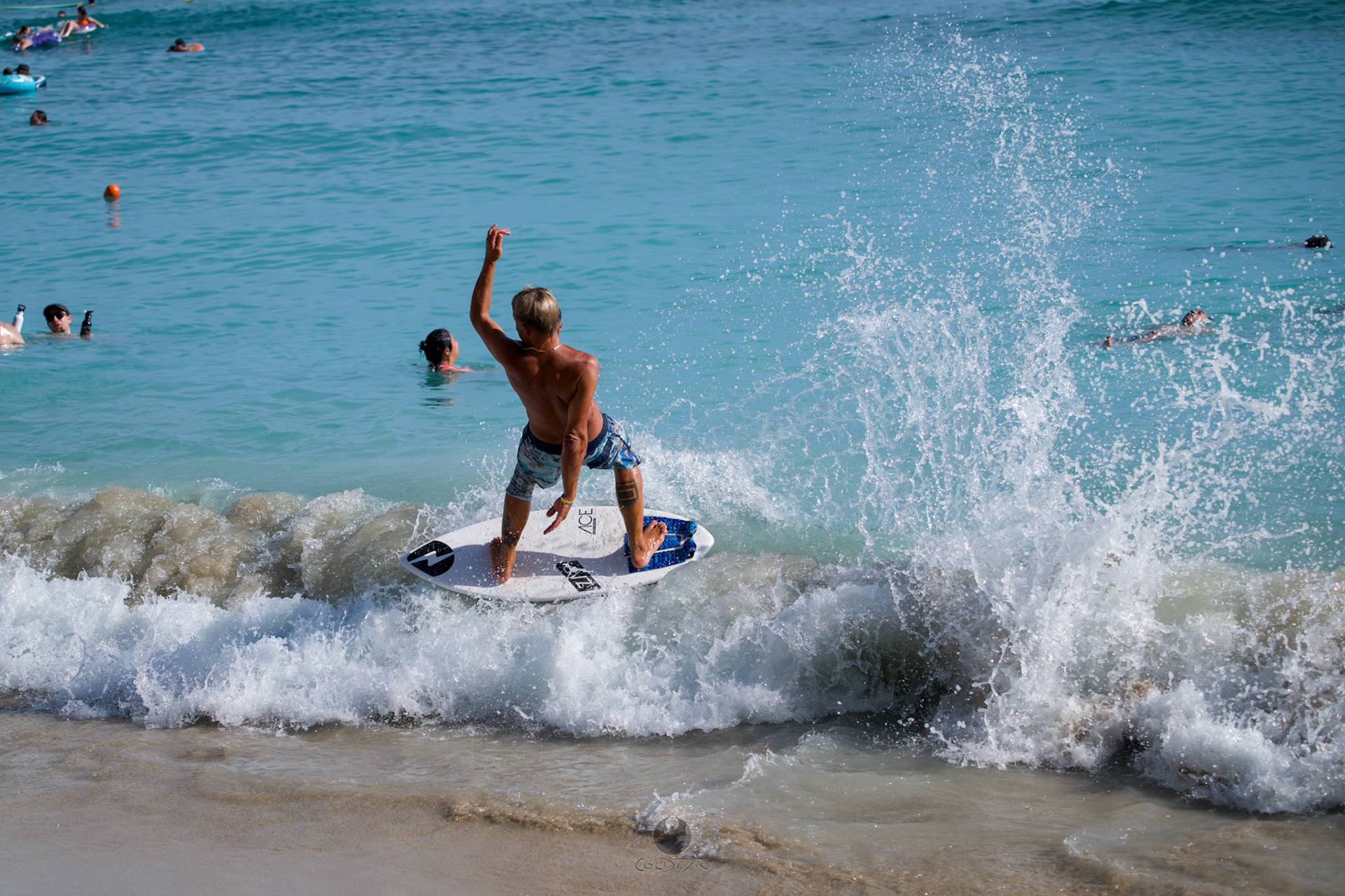 Brian "Hollywood" rips the Waikiki shore break.