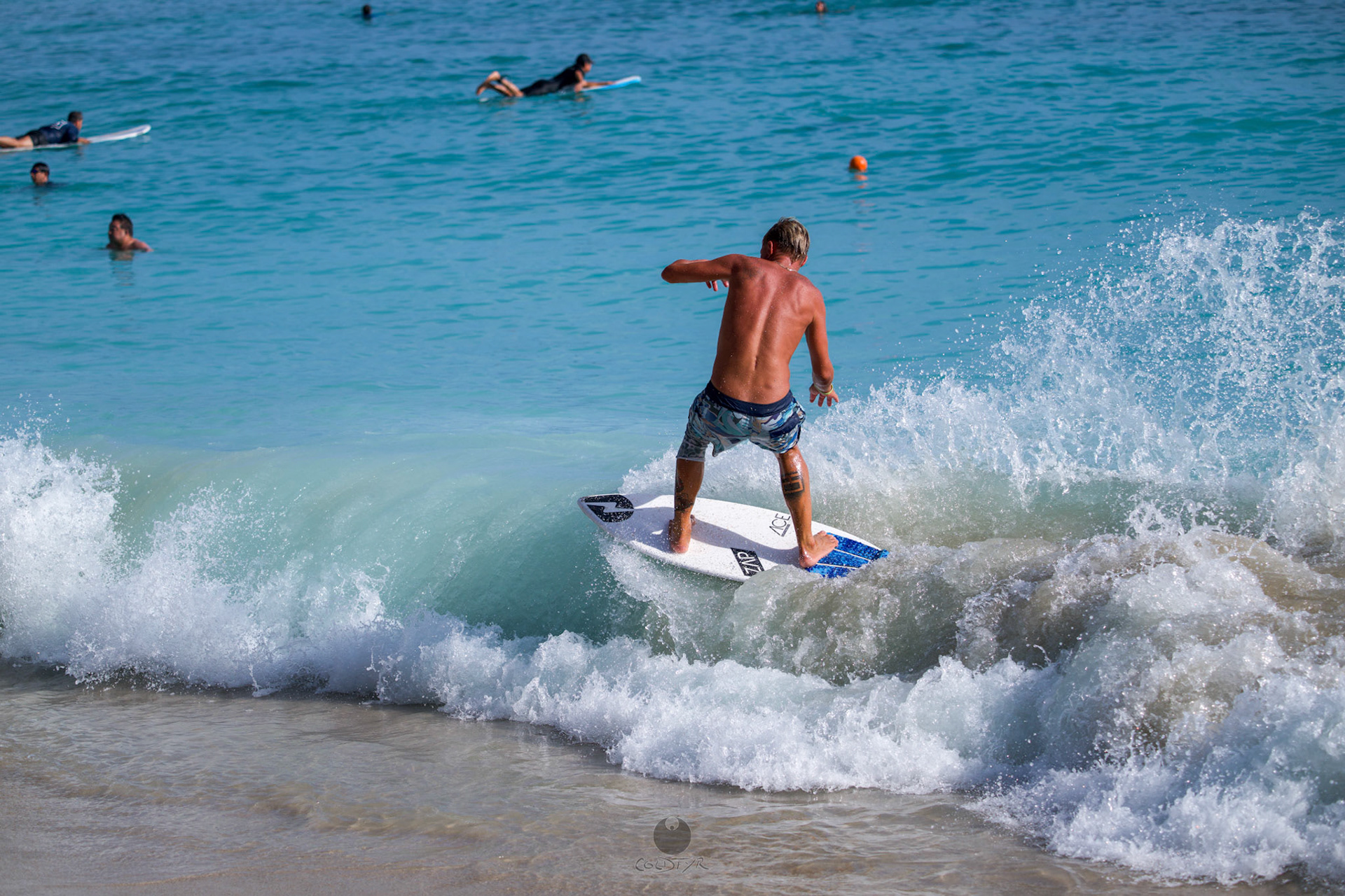 Brian "Hollywood" rips the Waikiki shore break.