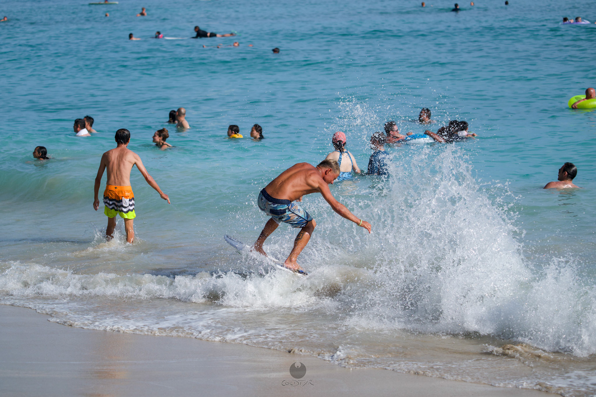 Brian "Hollywood" rips the Waikiki shore break.