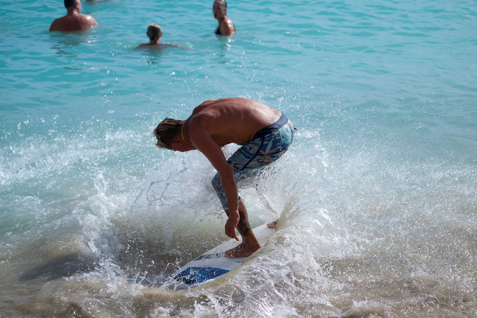 Brian "Hollywood" rips the Waikiki shore break.