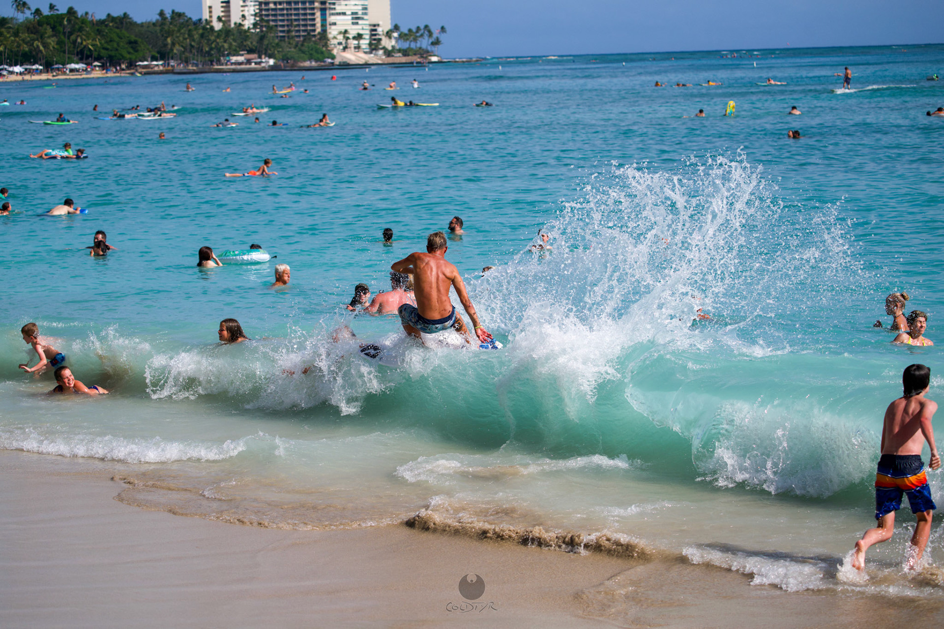 Brian "Hollywood" rips the Waikiki shore break.