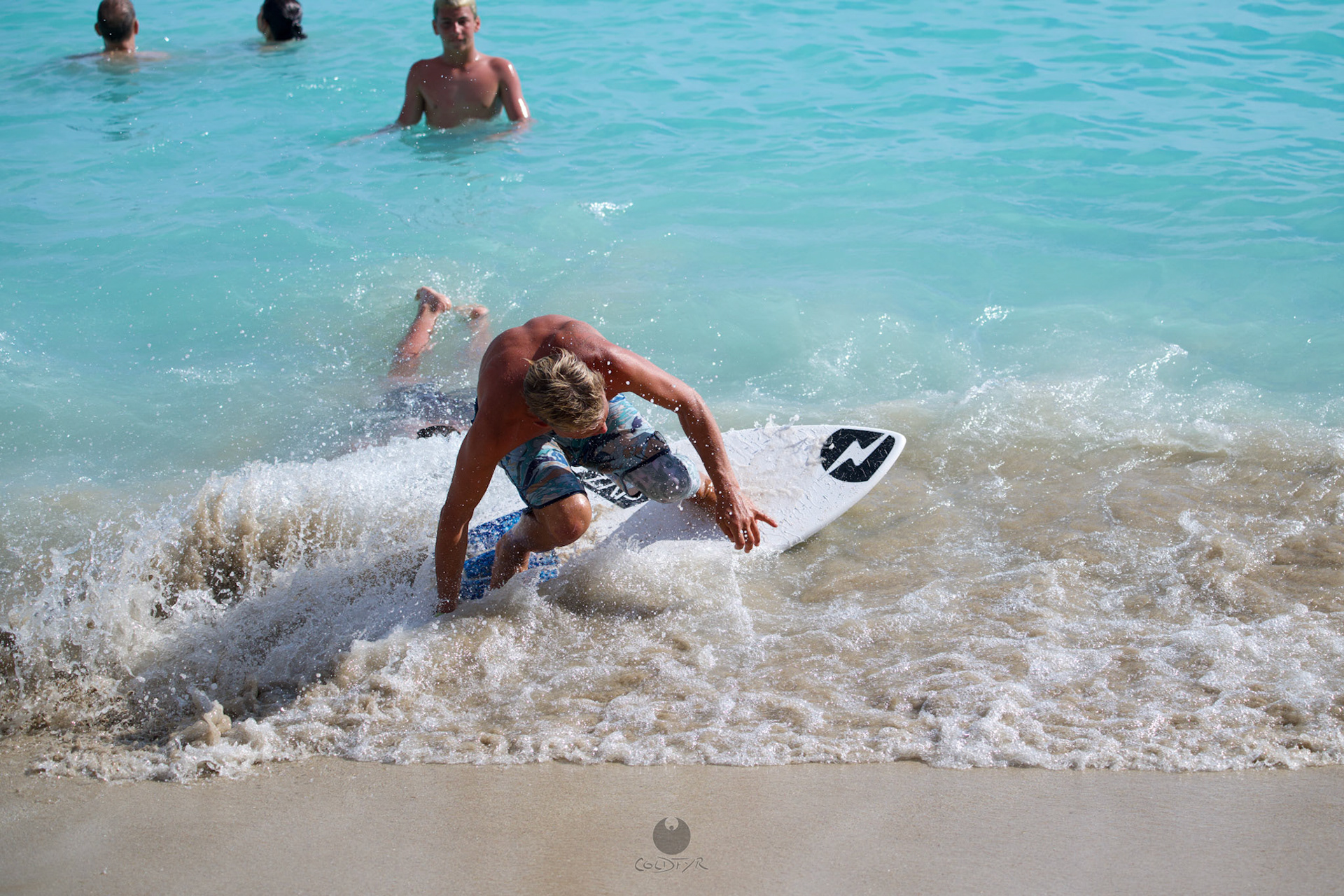 Brian "Hollywood" rips the Waikiki shore break.
