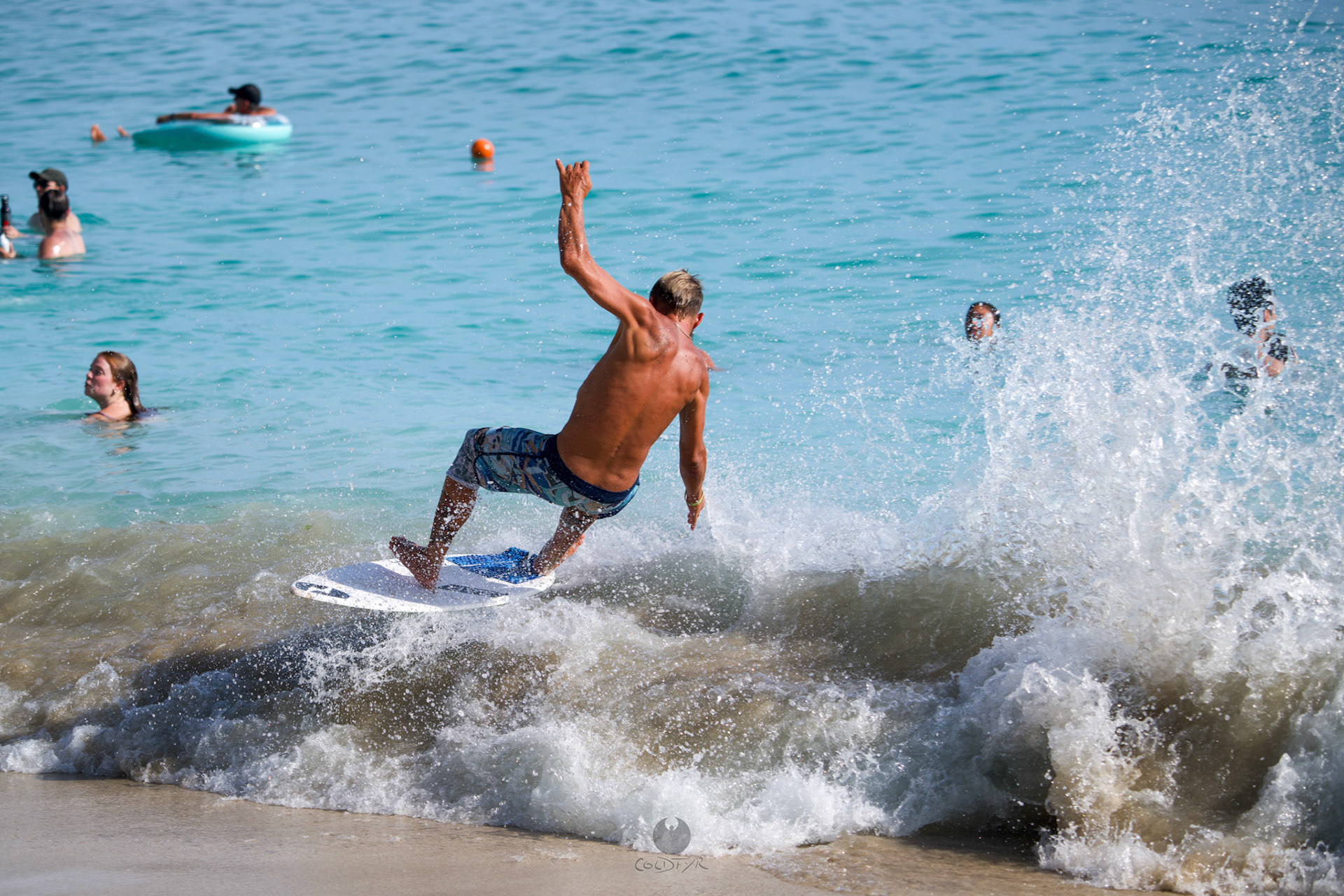 Brian "Hollywood" rips the Waikiki shore break.