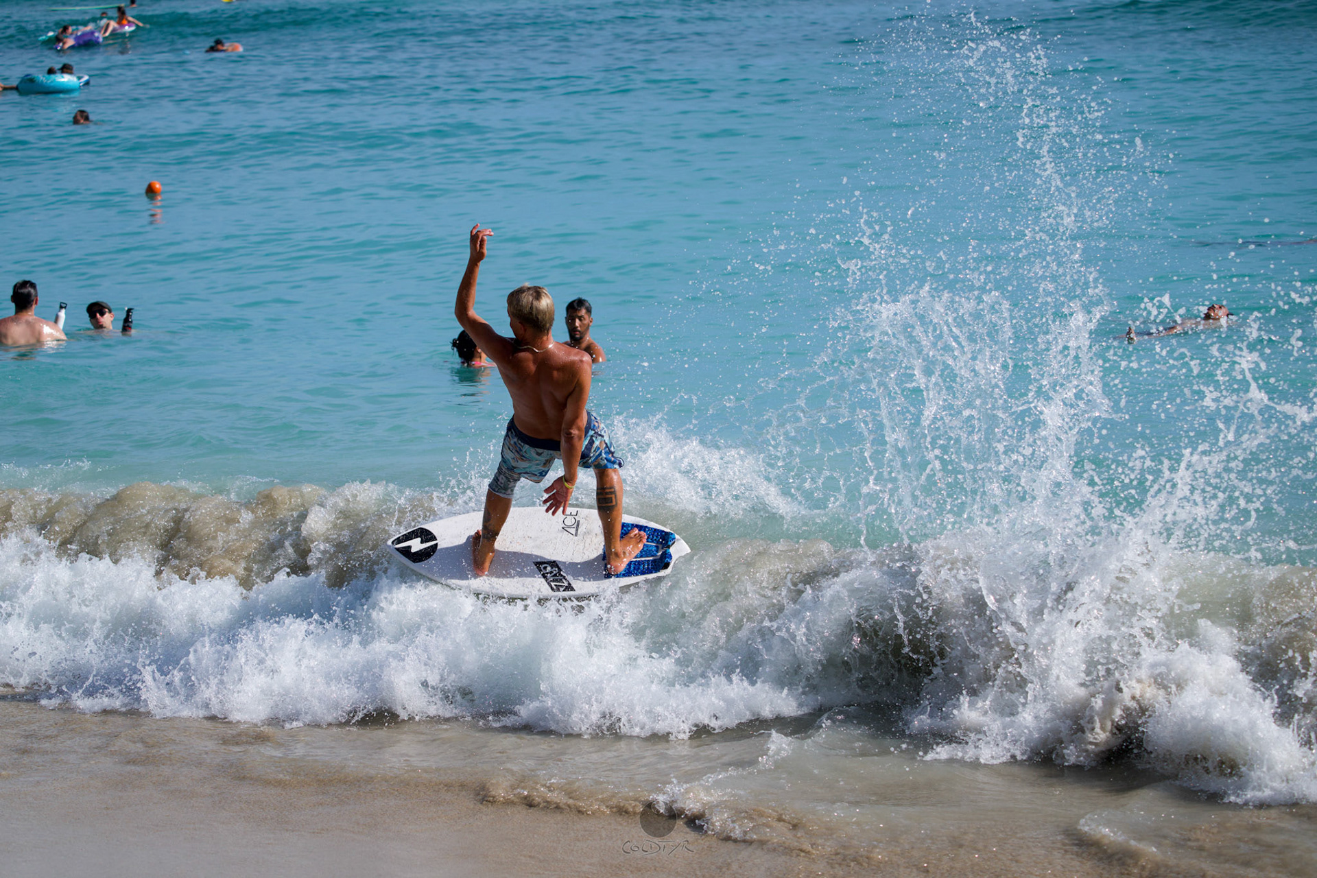 Brian "Hollywood" rips the Waikiki shore break.