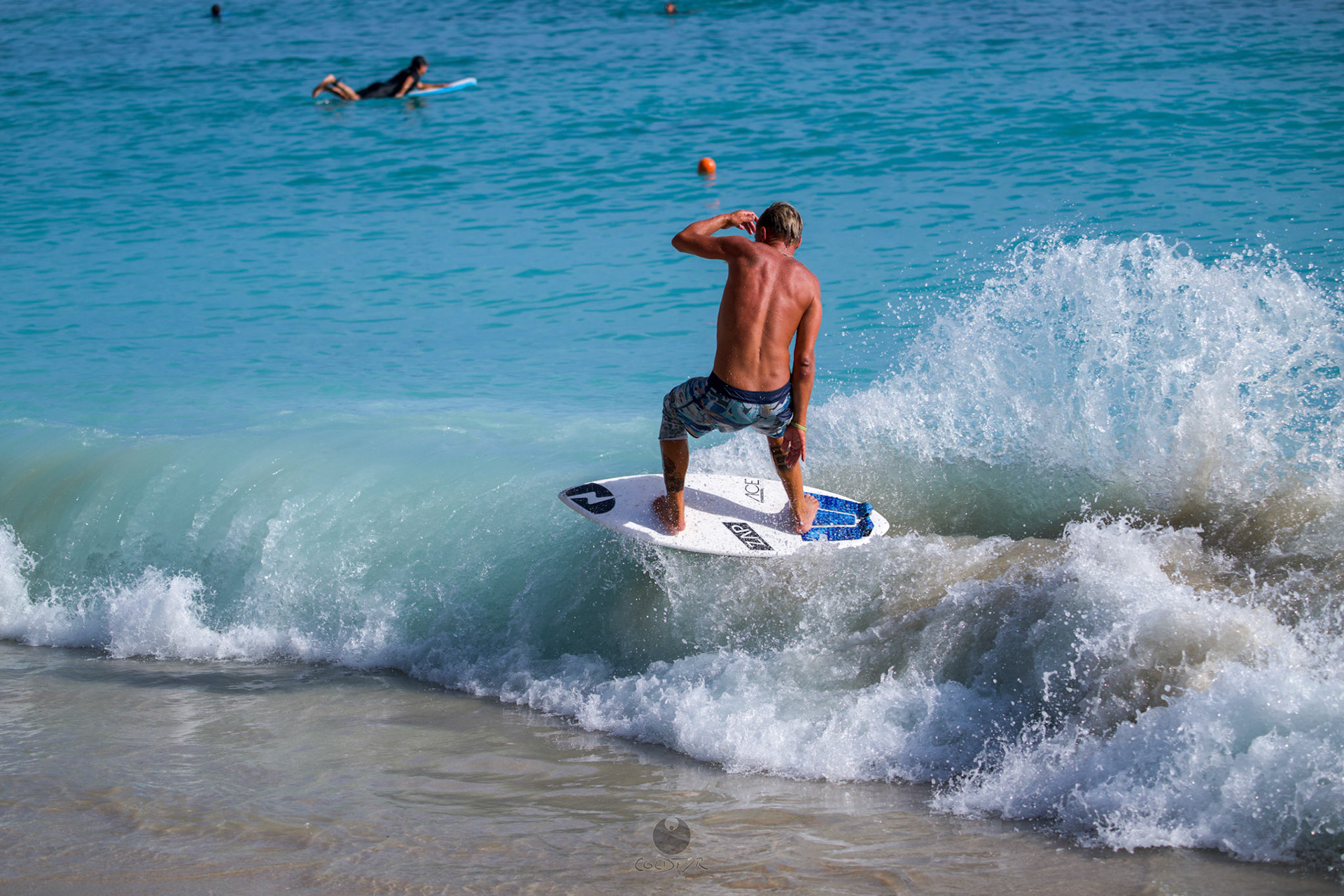 Brian "Hollywood" rips the Waikiki shore break.