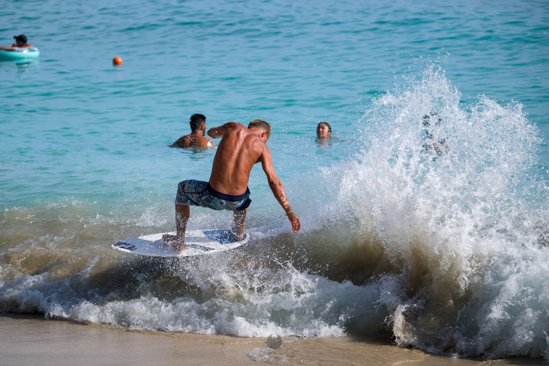 Brian "Hollywood" rips the Waikiki shore break.