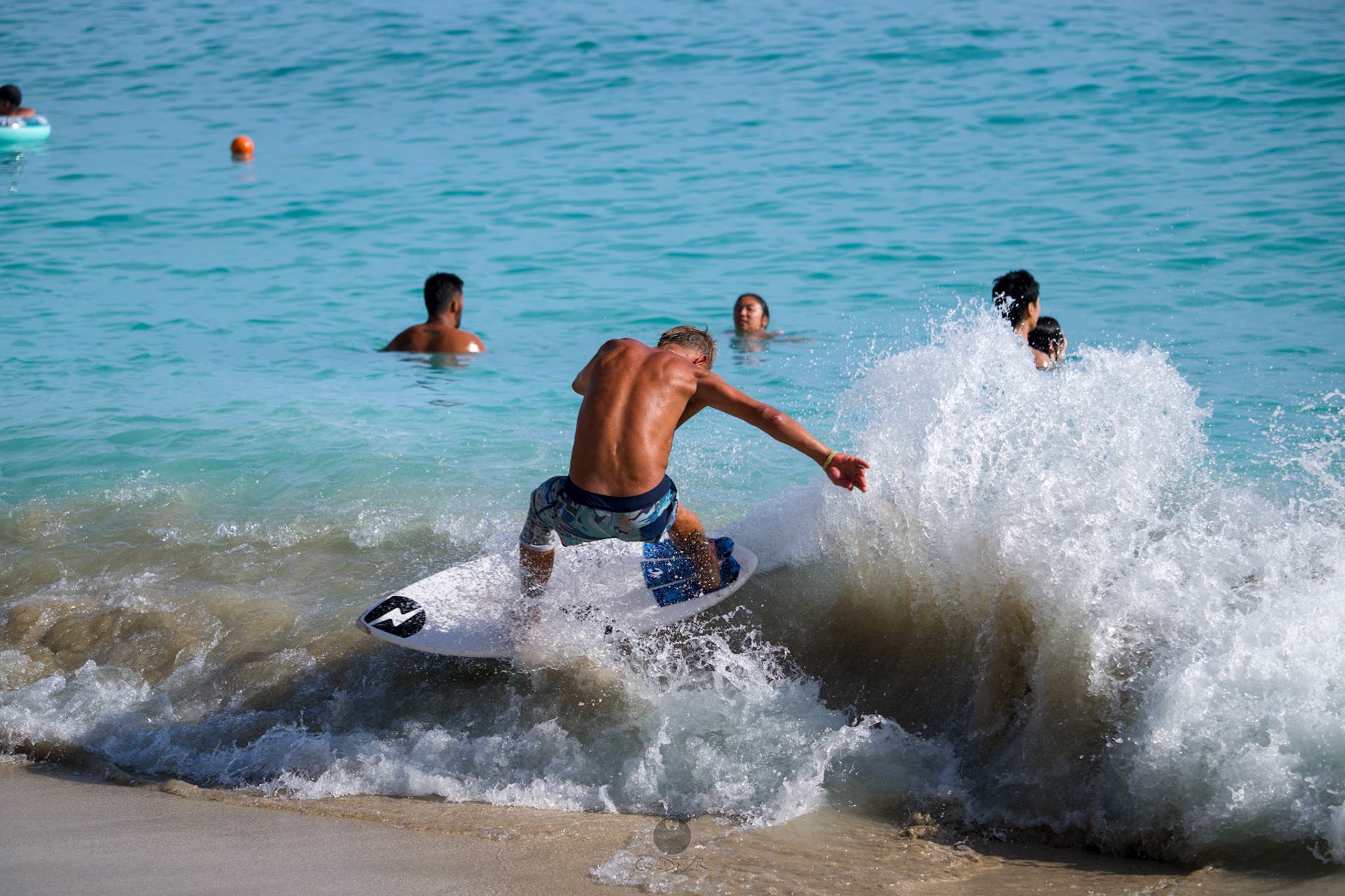 Brian "Hollywood" rips the Waikiki shore break.