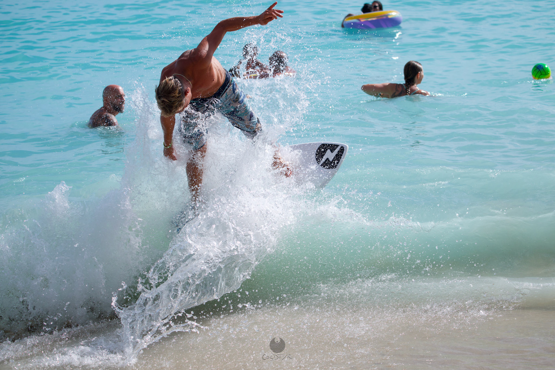Brian "Hollywood" rips the Waikiki shore break.