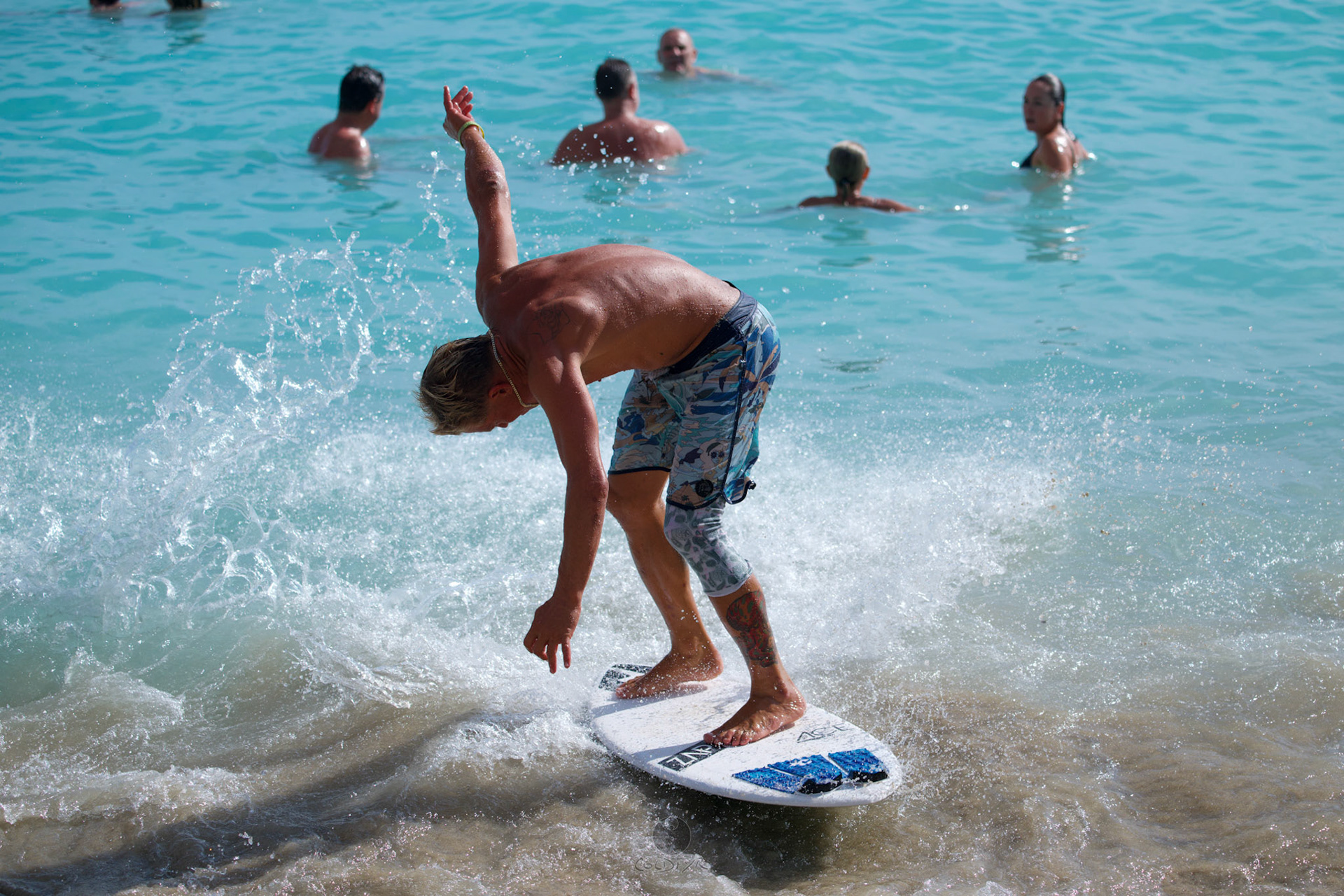 Brian "Hollywood" rips the Waikiki shore break.