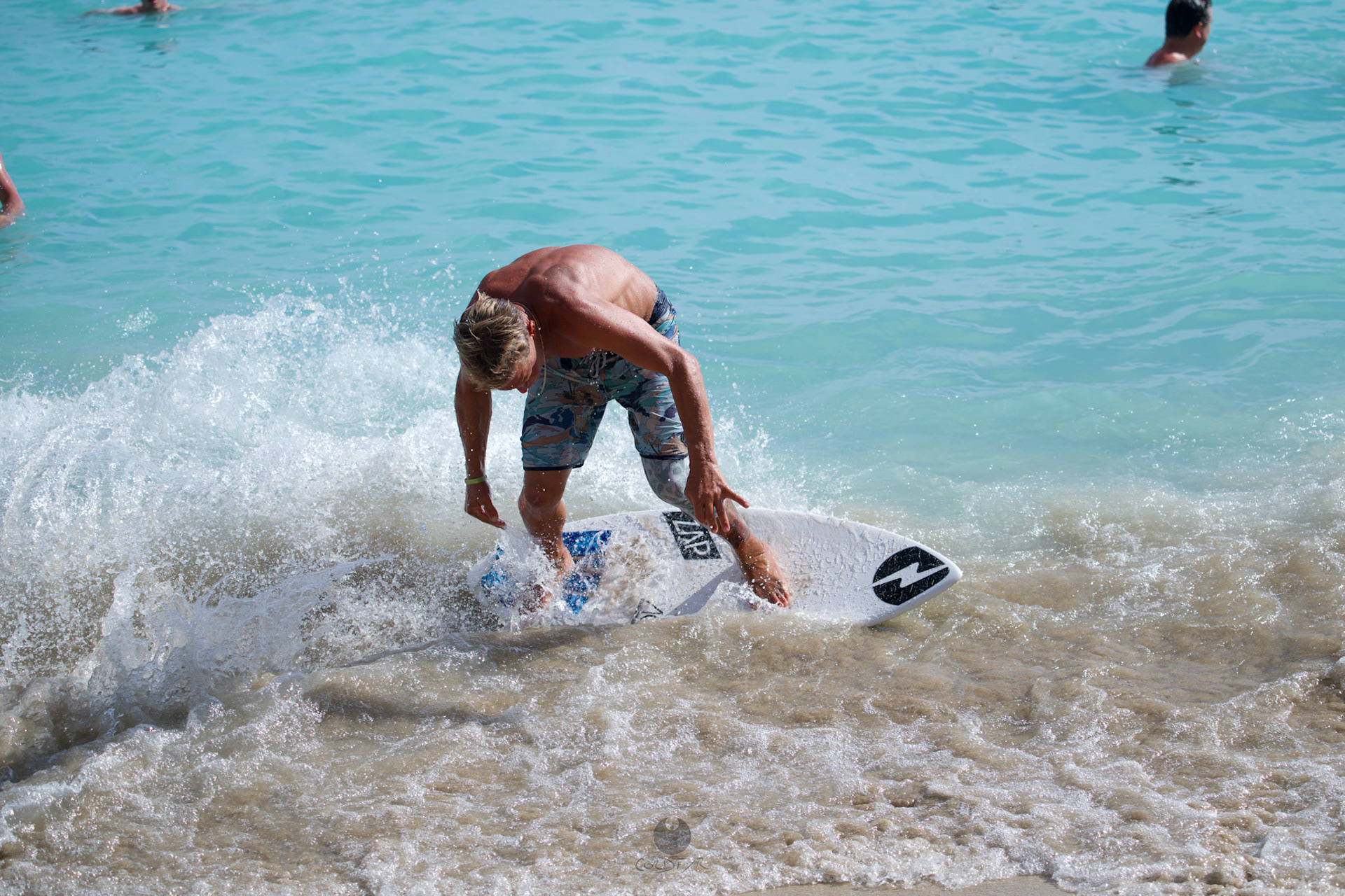 Brian "Hollywood" rips the Waikiki shore break.