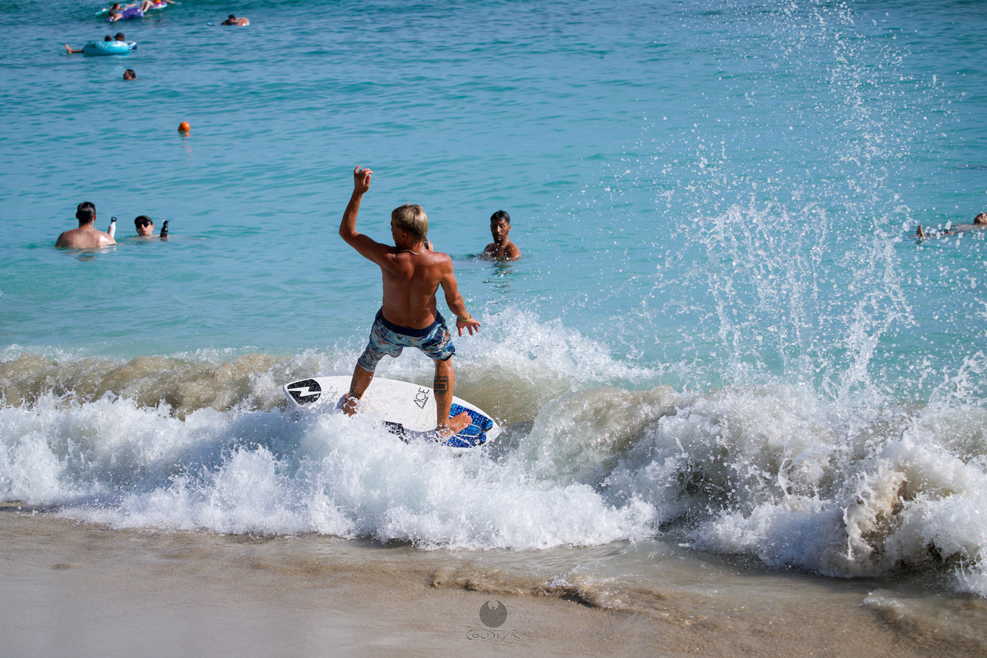 Brian "Hollywood" rips the Waikiki shore break.