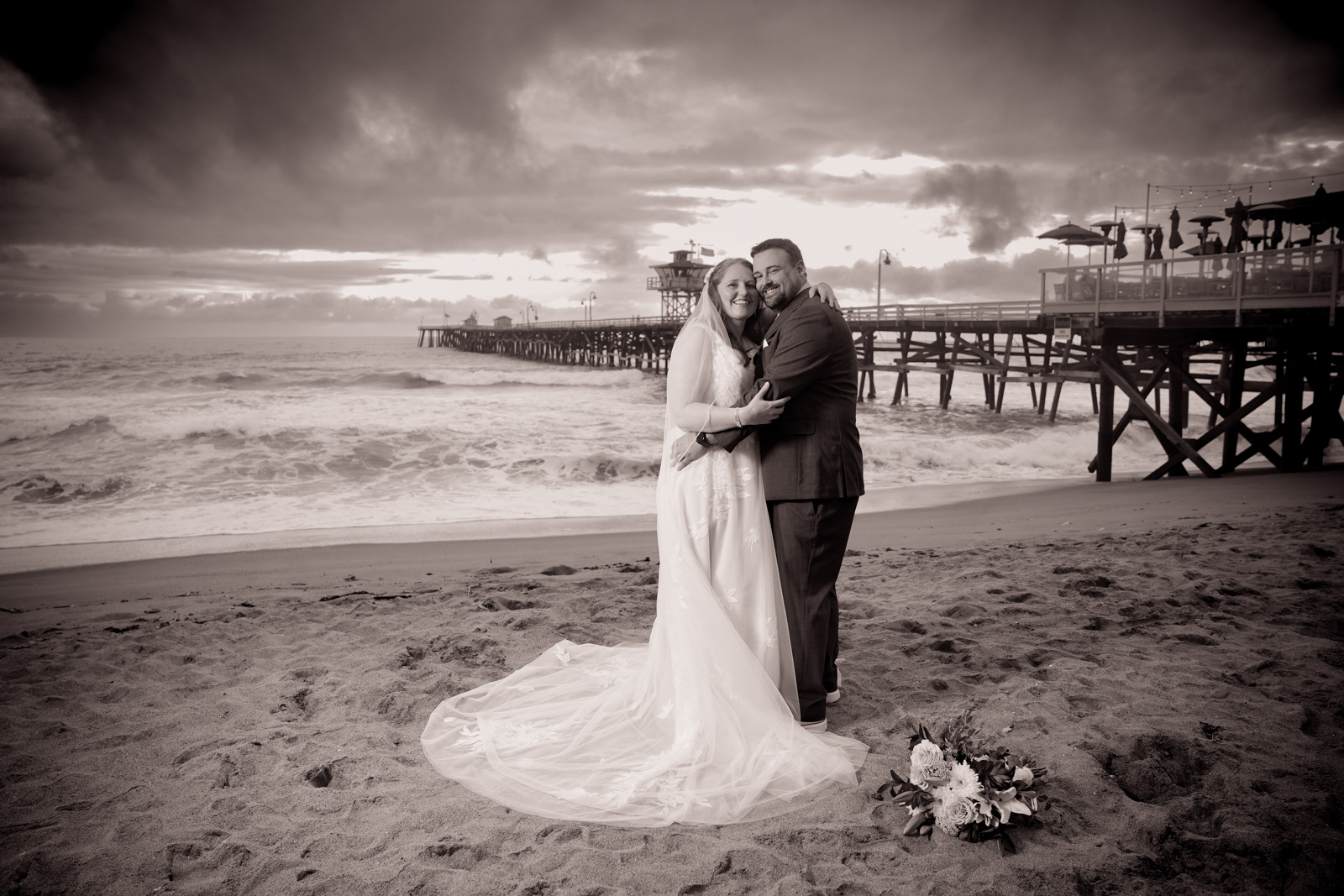 winter beach elopement san clemente, during a storm. 