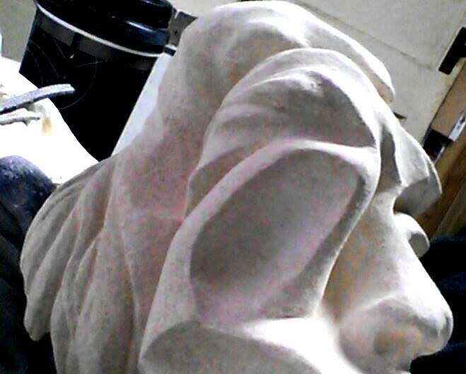 Hand carved limestone by Debora Alanna.