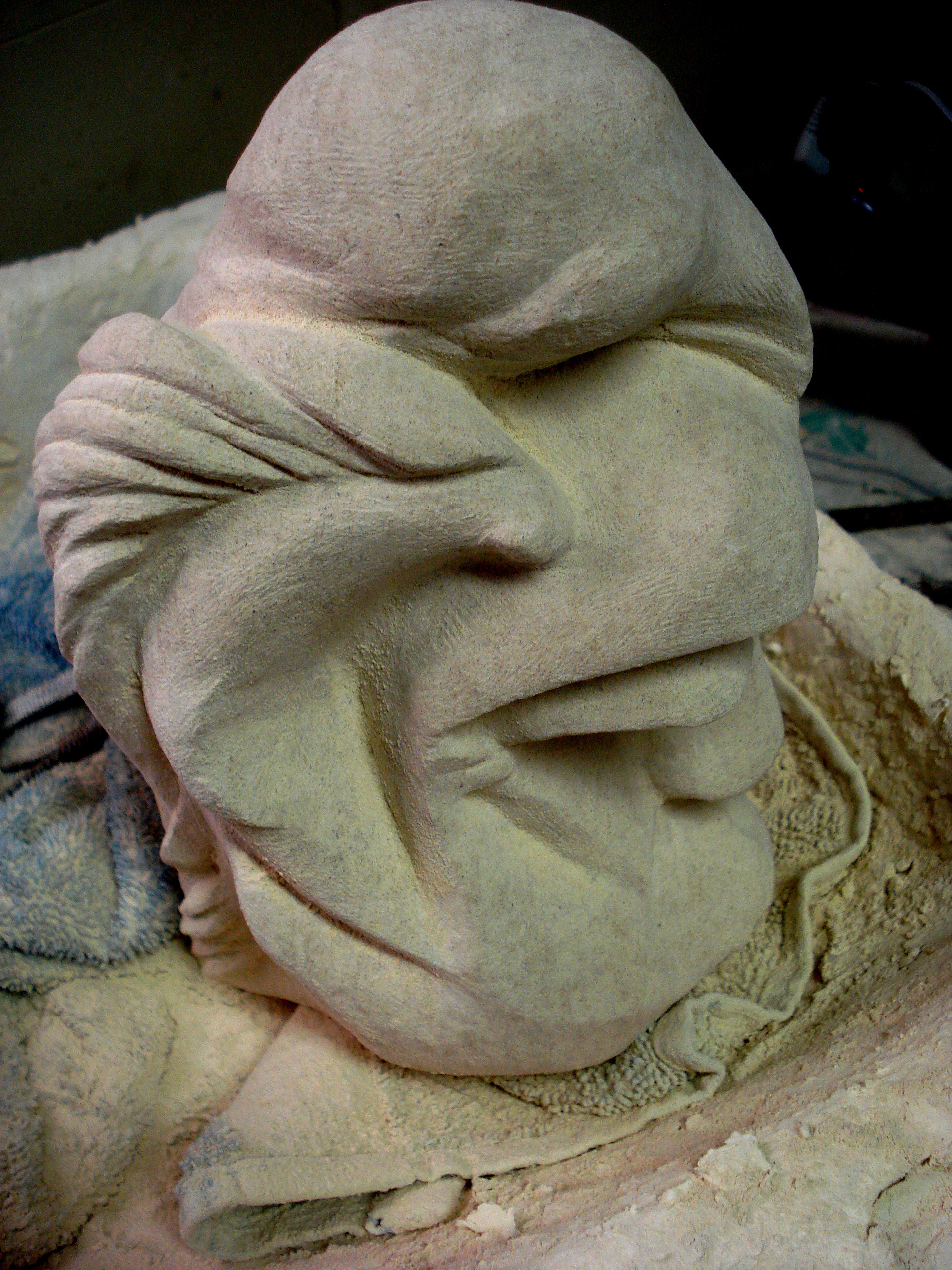 Hand carved limestone by Debora Alanna.