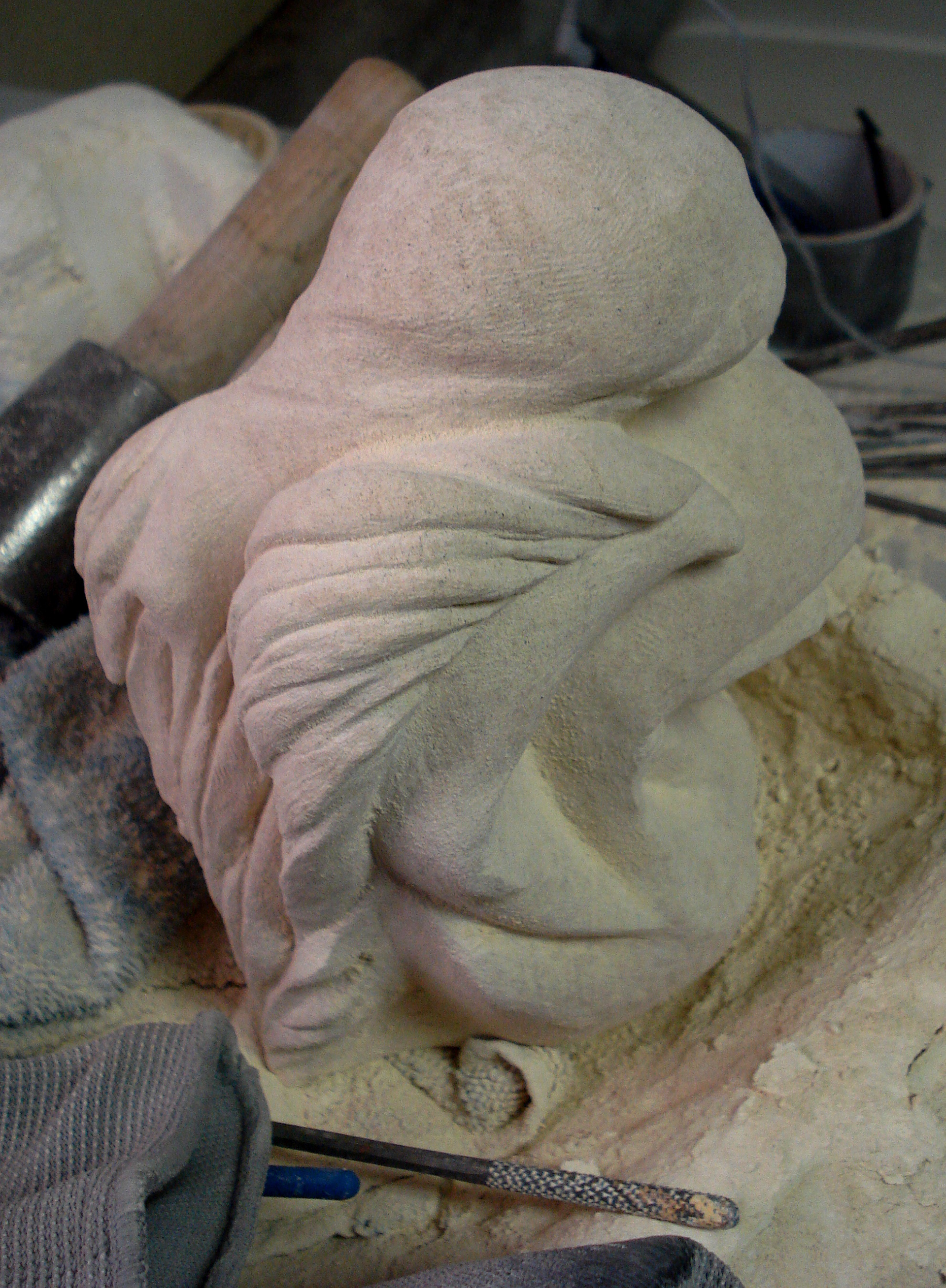 Hand carved limestone by Debora Alanna.