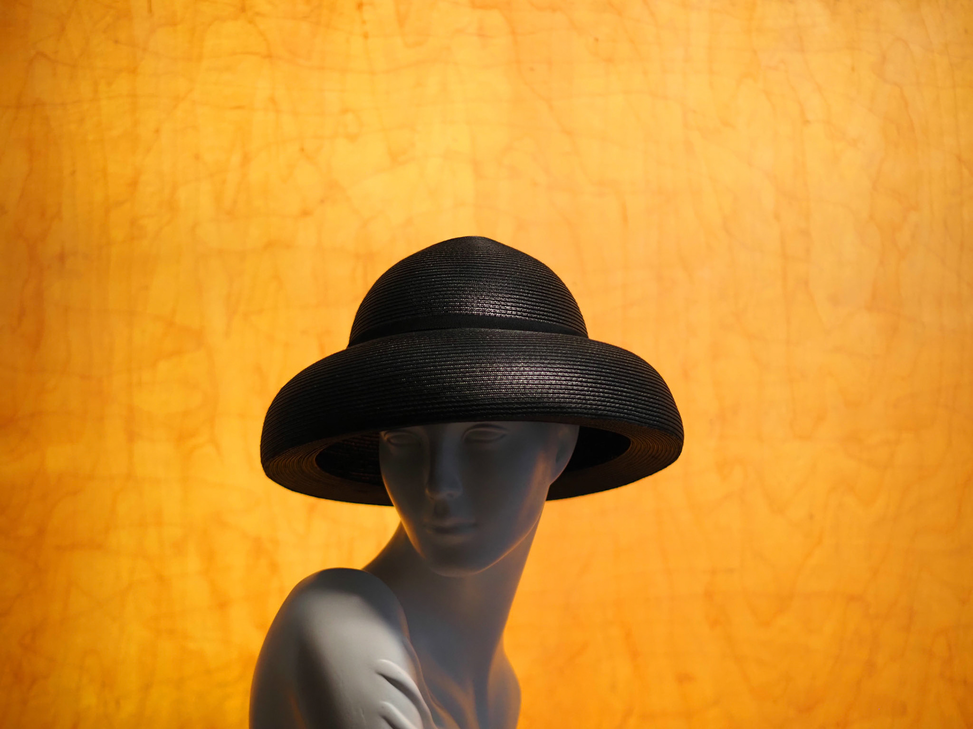 POND • down brimmed hat in stitched braid
