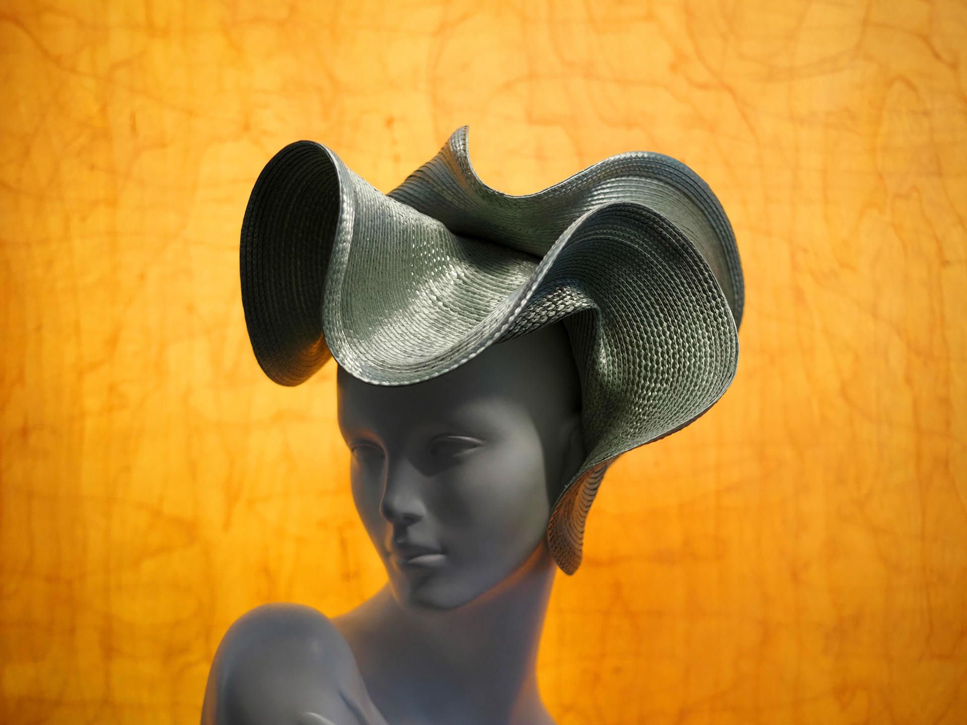 SUNAMI • sculptural headpiece in stitched braid