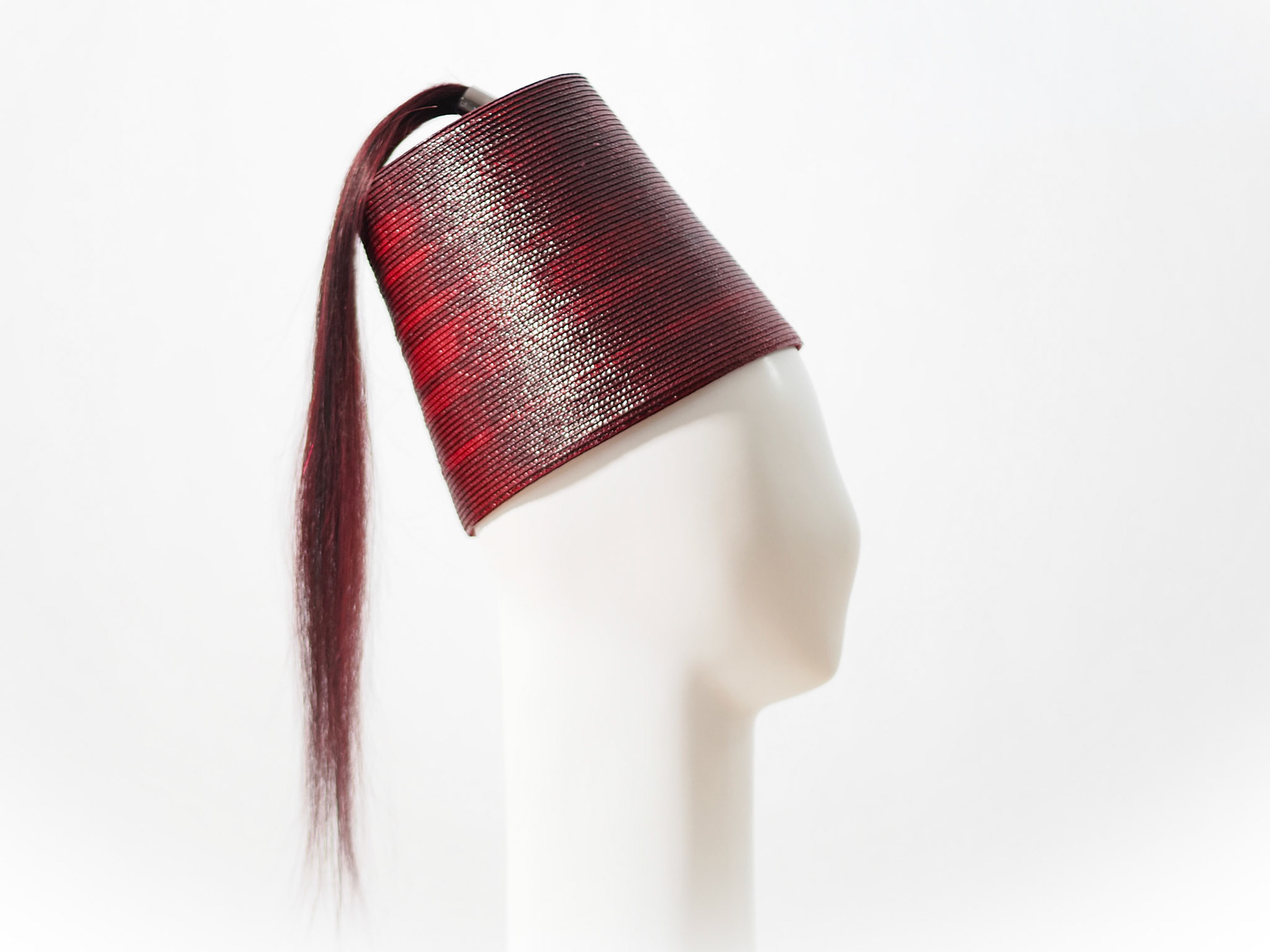 ZAY • striped lacquered fez in stitched Swiss braid with hair tassel