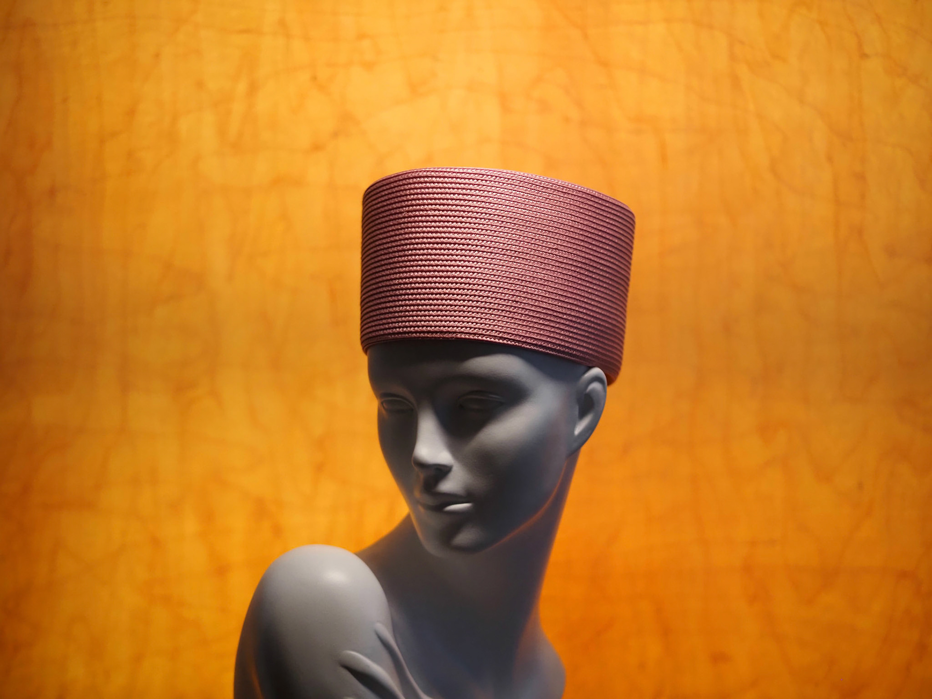 LEMURIA • large pillbox in stitched braid