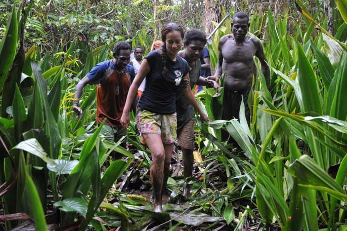 Melewati hutan sagu dengan medan lumpur