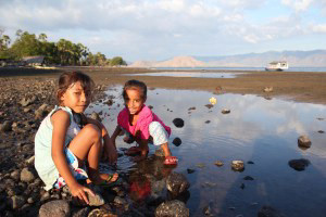 The local kids playing at the beach