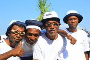 The local participants wearing traditional goggles made from wood and glass
