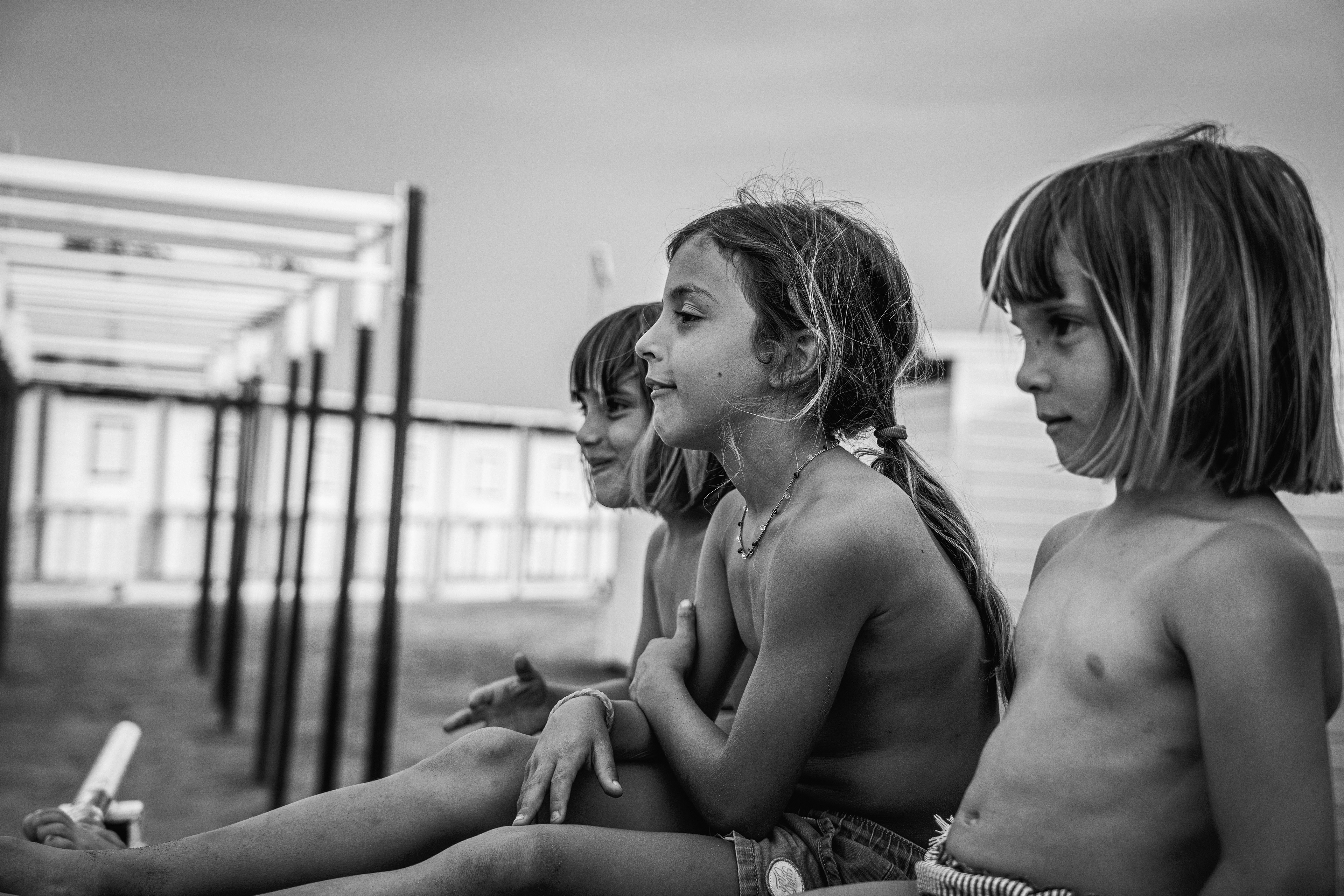 A typical life in Ostia, three sisters play on the beach.