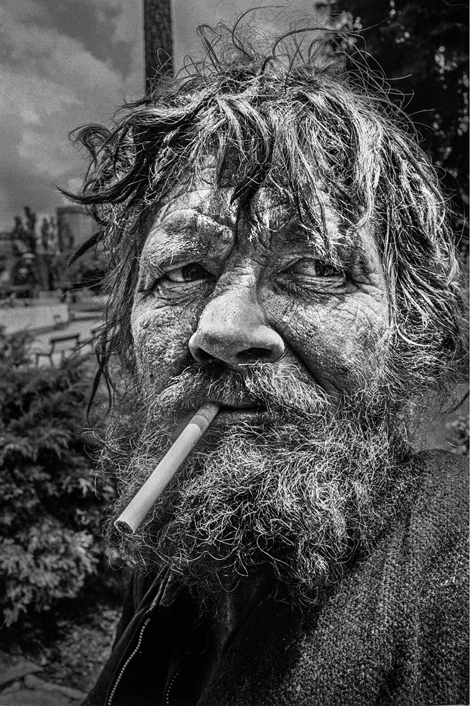 Man with unlit cigarette